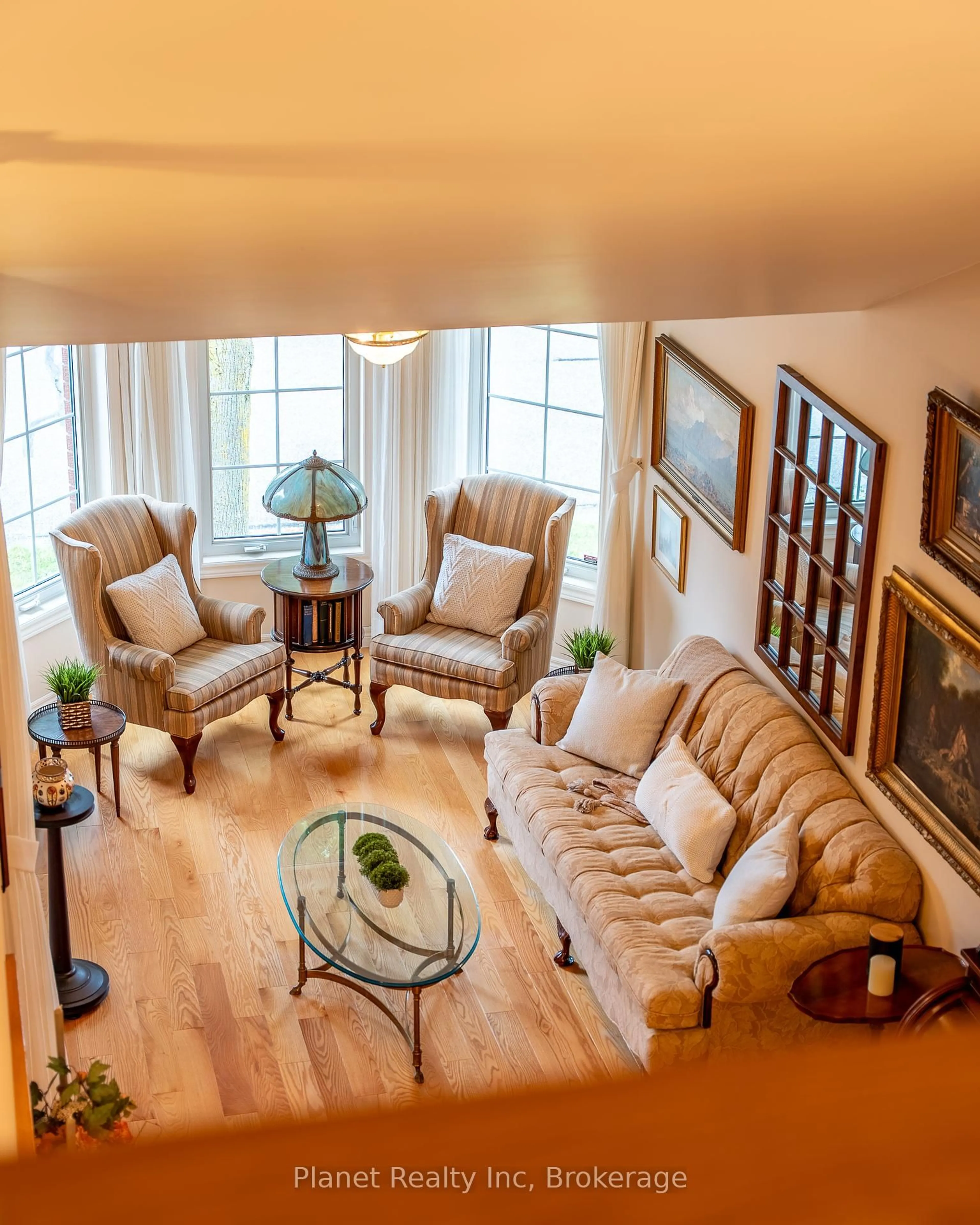 Living room with furniture, wood/laminate floor for 67 White Pine Way, Guelph Ontario N1G 4X7
