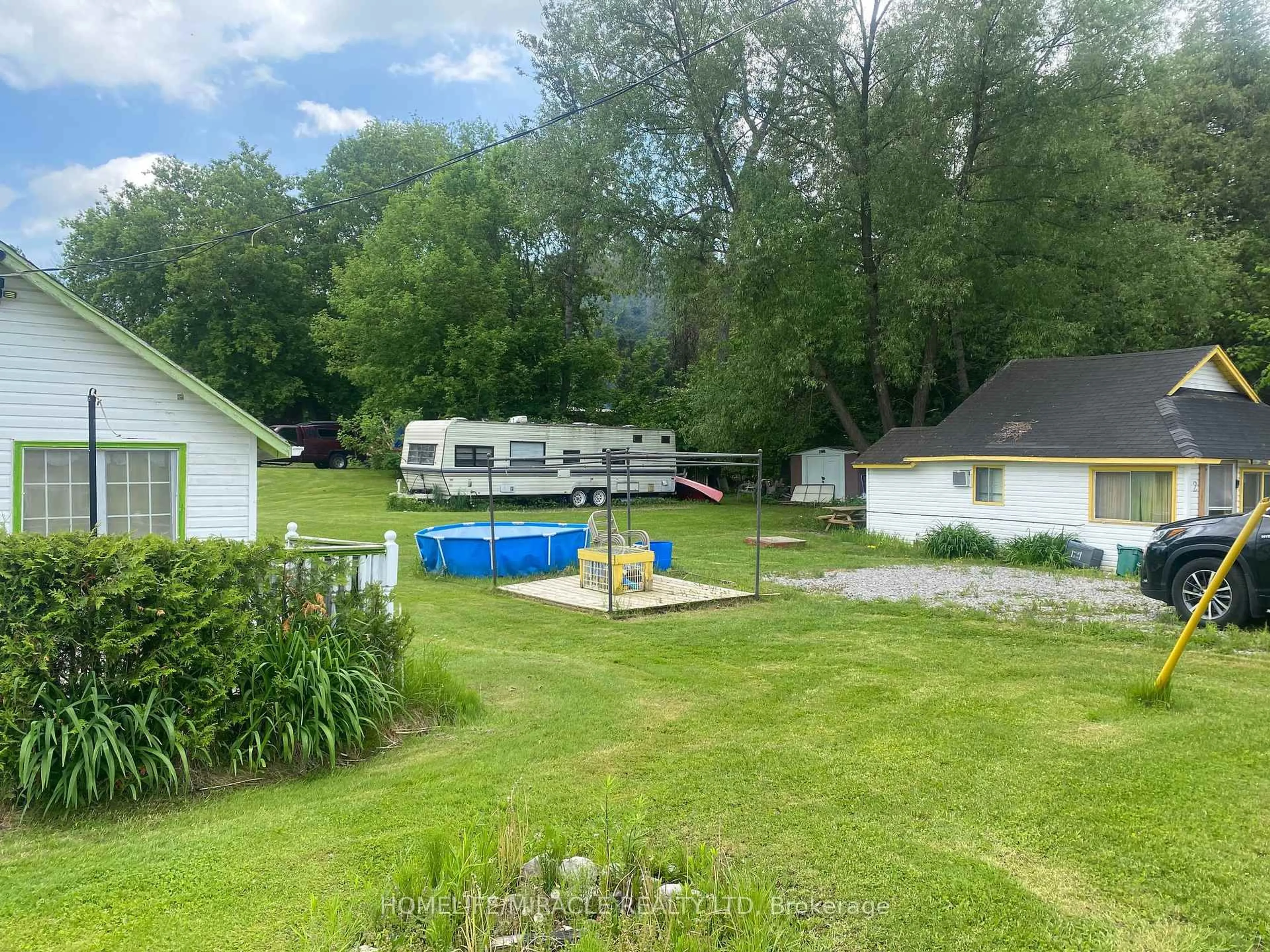 A pic from outside/outdoor area/front of a property/back of a property/a pic from drone, water/lake/river/ocean view for 211 Dunnette Landing Rd #1 & 2, Alnwick/Haldimand Ontario K0K 2X0
