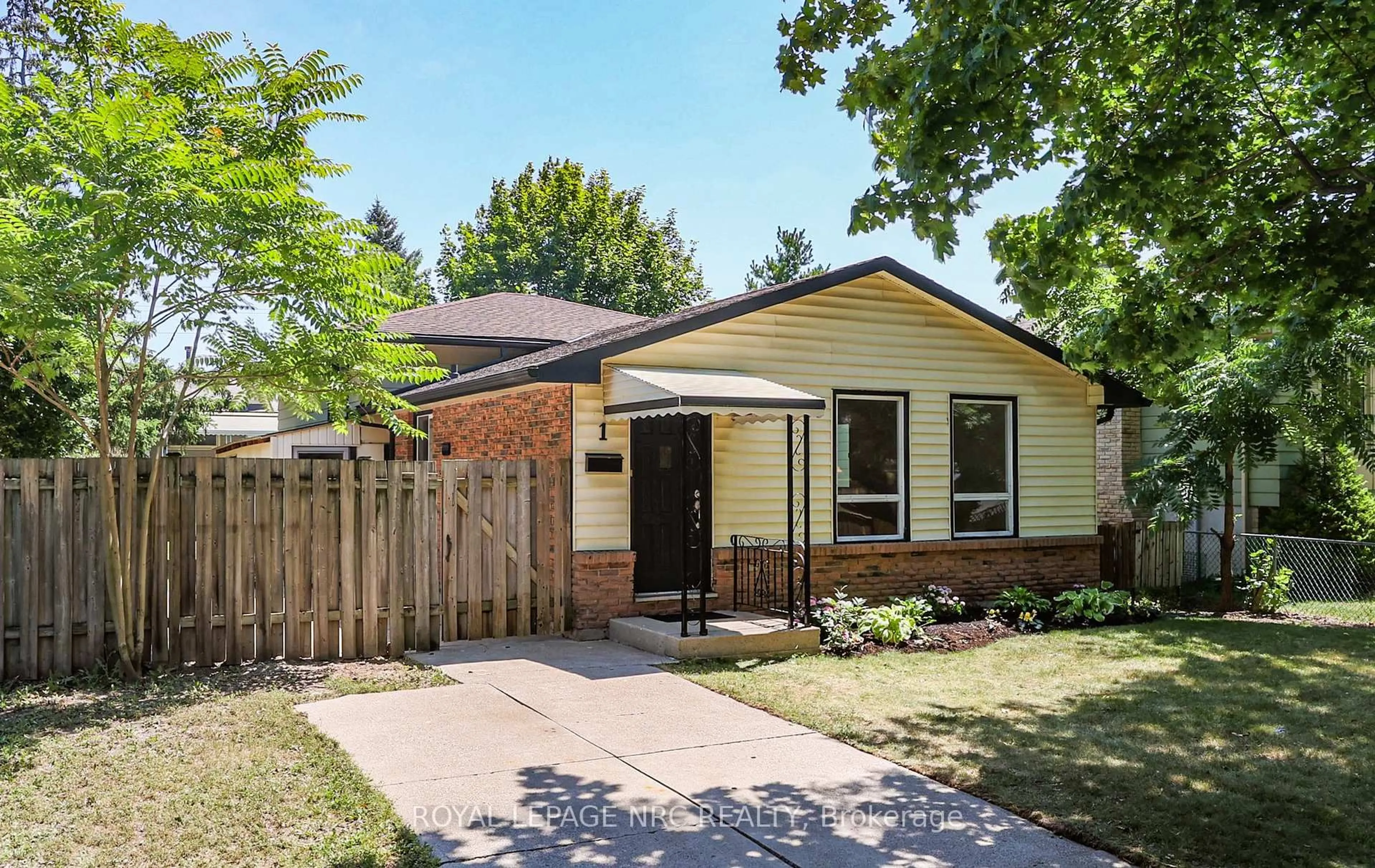 Home with brick exterior material, street for 1 Rainbow Dr, St. Catharines Ontario L2M 7A2