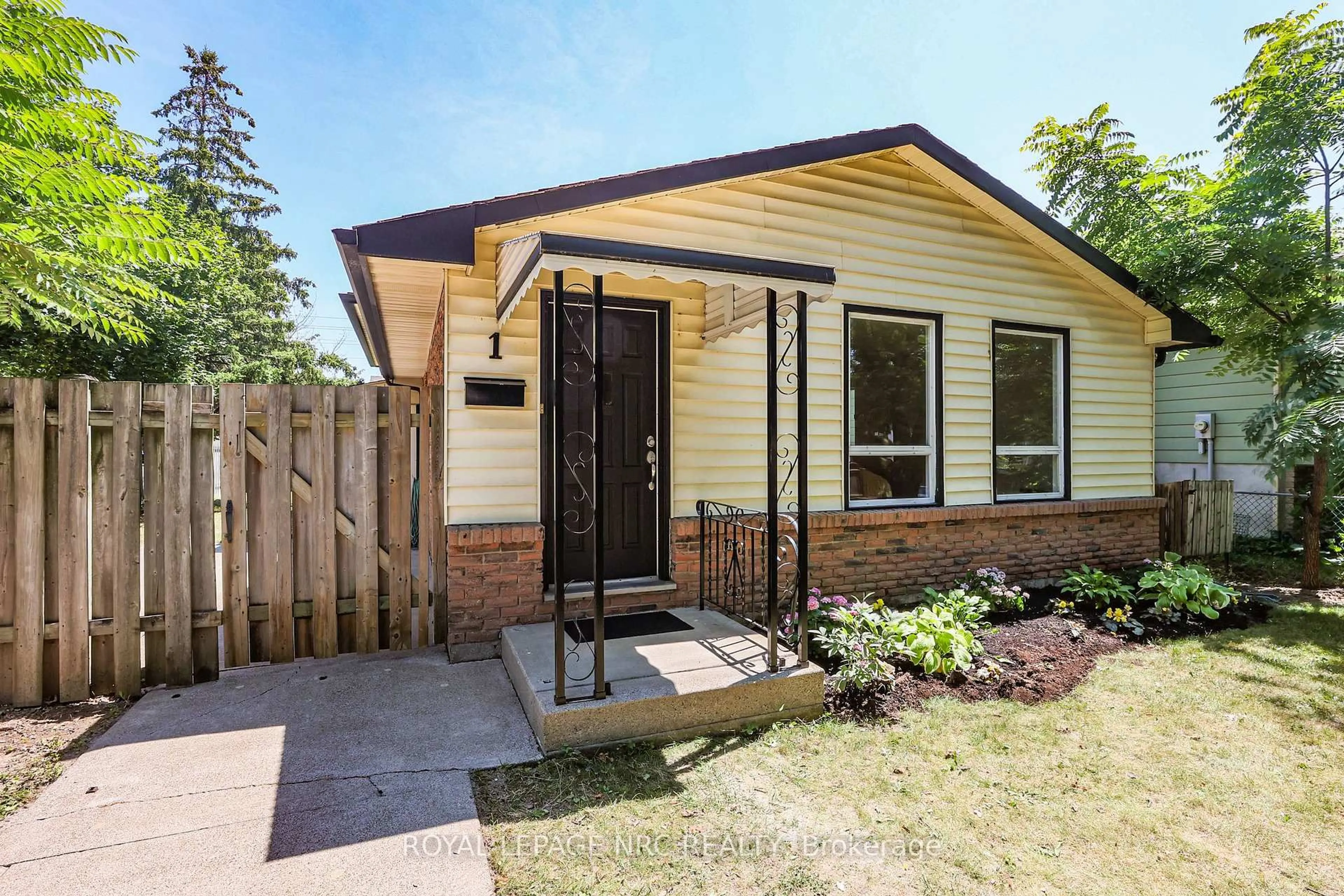 Home with brick exterior material, street for 1 Rainbow Dr, St. Catharines Ontario L2M 7A2