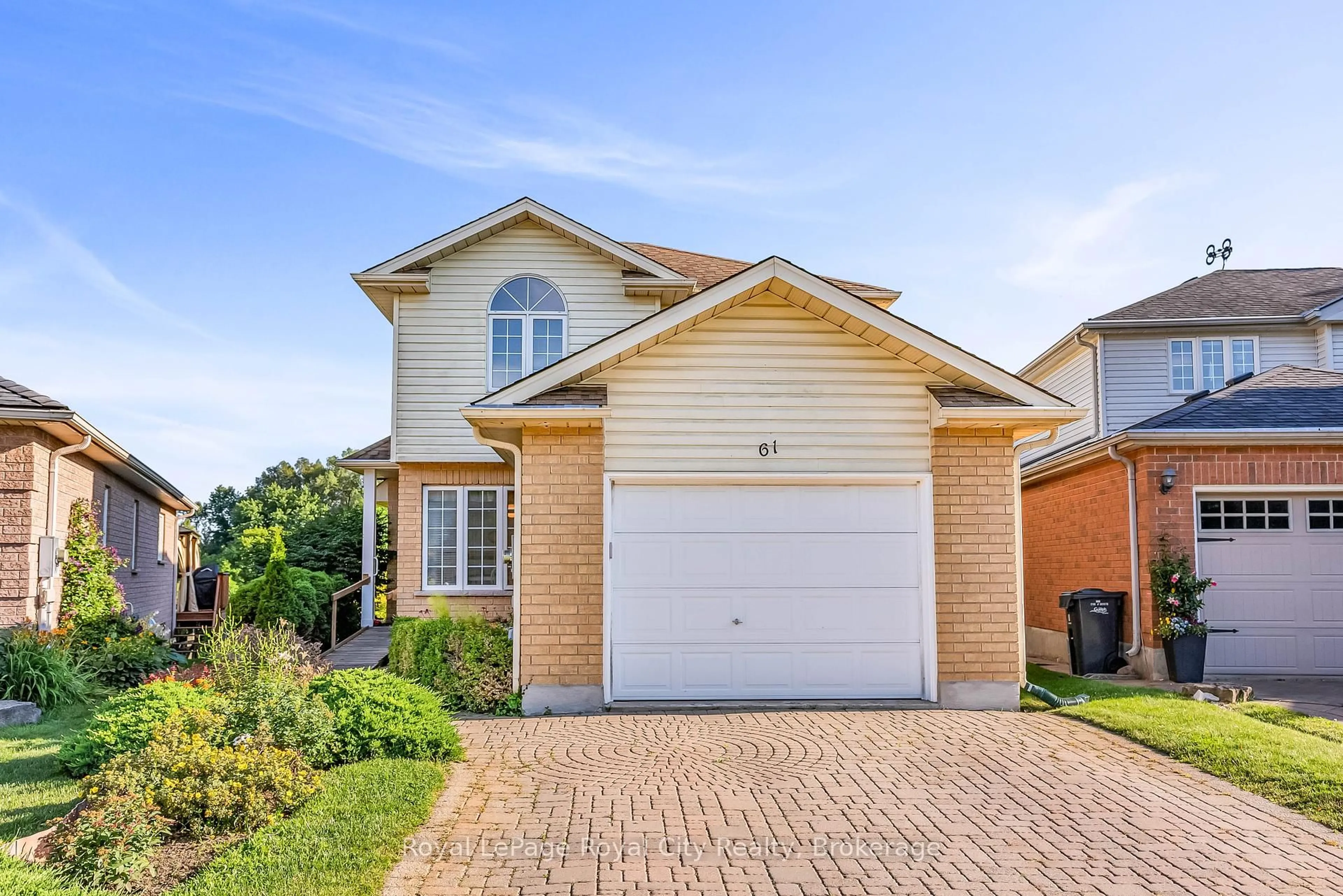 Home with brick exterior material, street for 61 Waxwing Cres, Guelph Ontario N1C 1E3