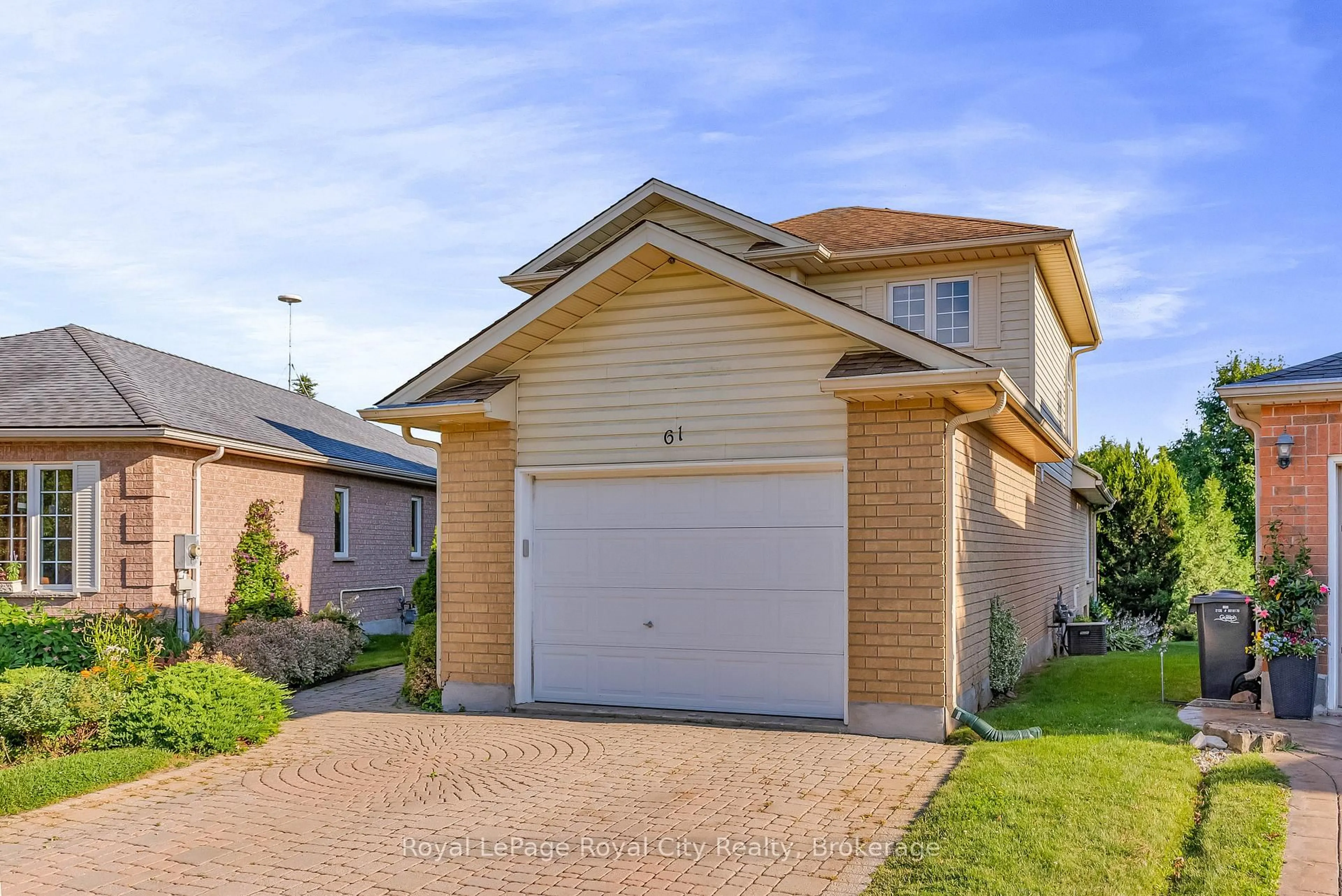 Home with brick exterior material, street for 61 Waxwing Cres, Guelph Ontario N1C 1E3