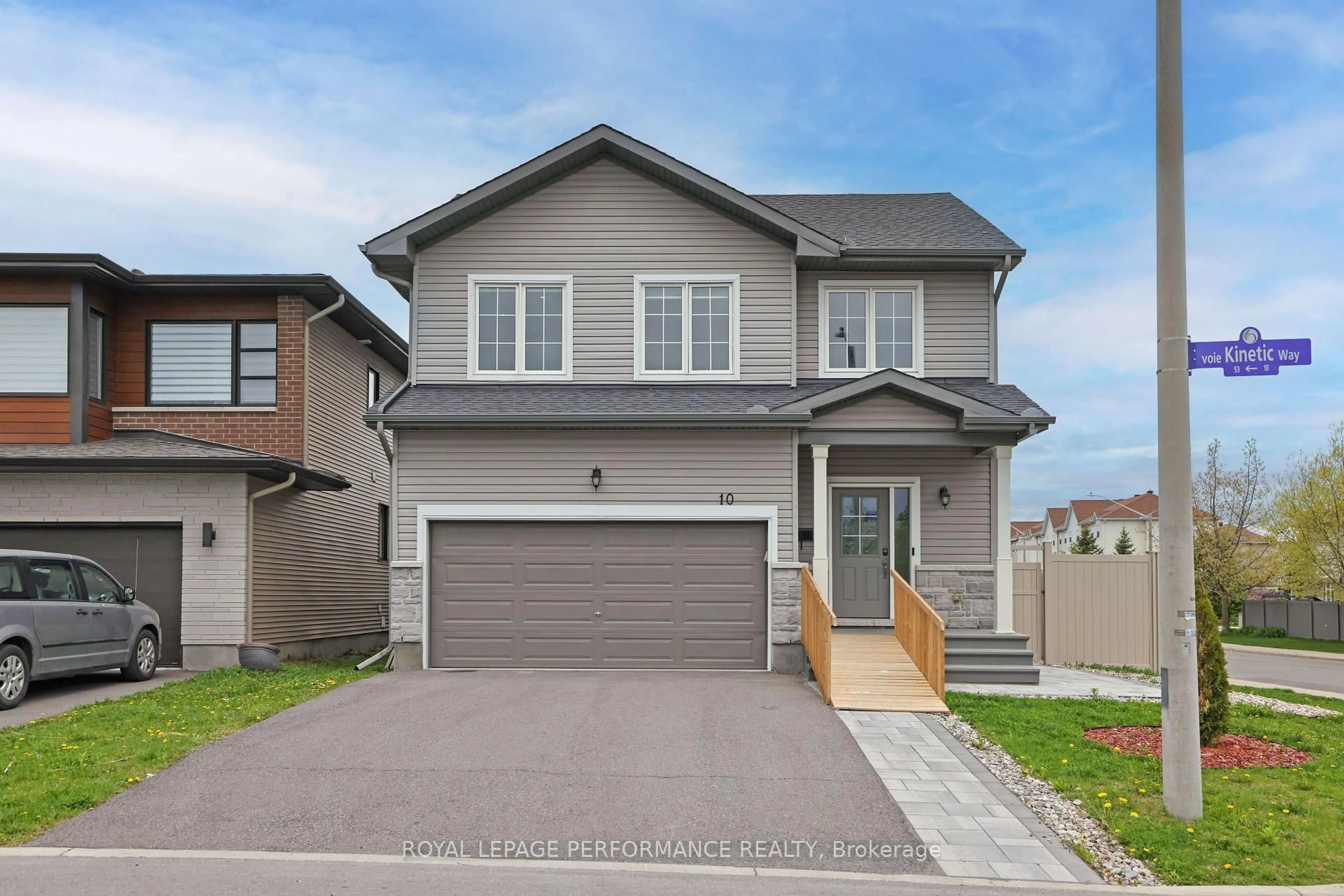 Home with vinyl exterior material, street for 10 Kinetic Way, Ottawa Ontario K2J 0C9