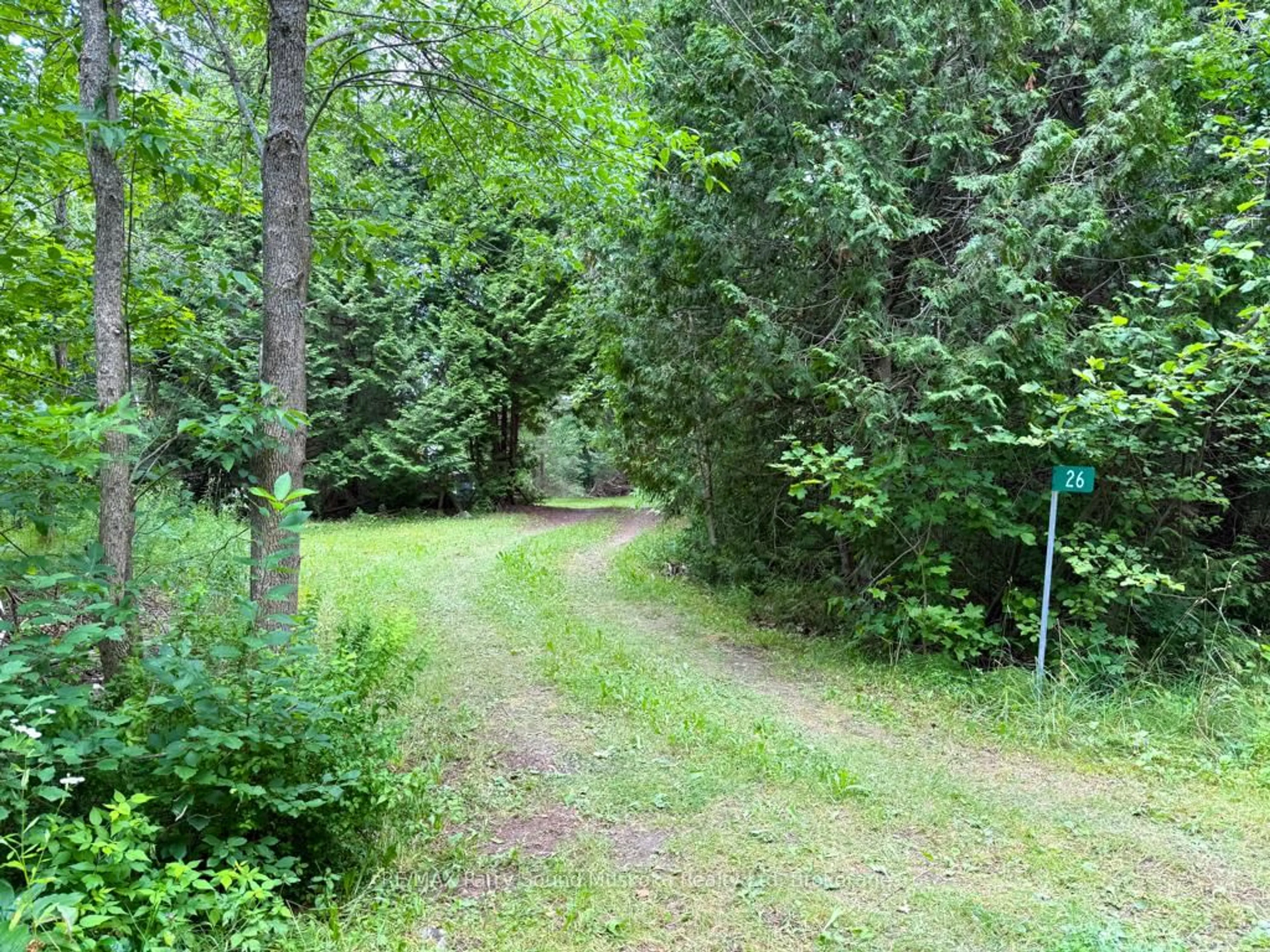 A pic from outside/outdoor area/front of a property/back of a property/a pic from drone, forest/trees view for 26 Bestwick Cres, Whitestone Ontario P0A 1G0