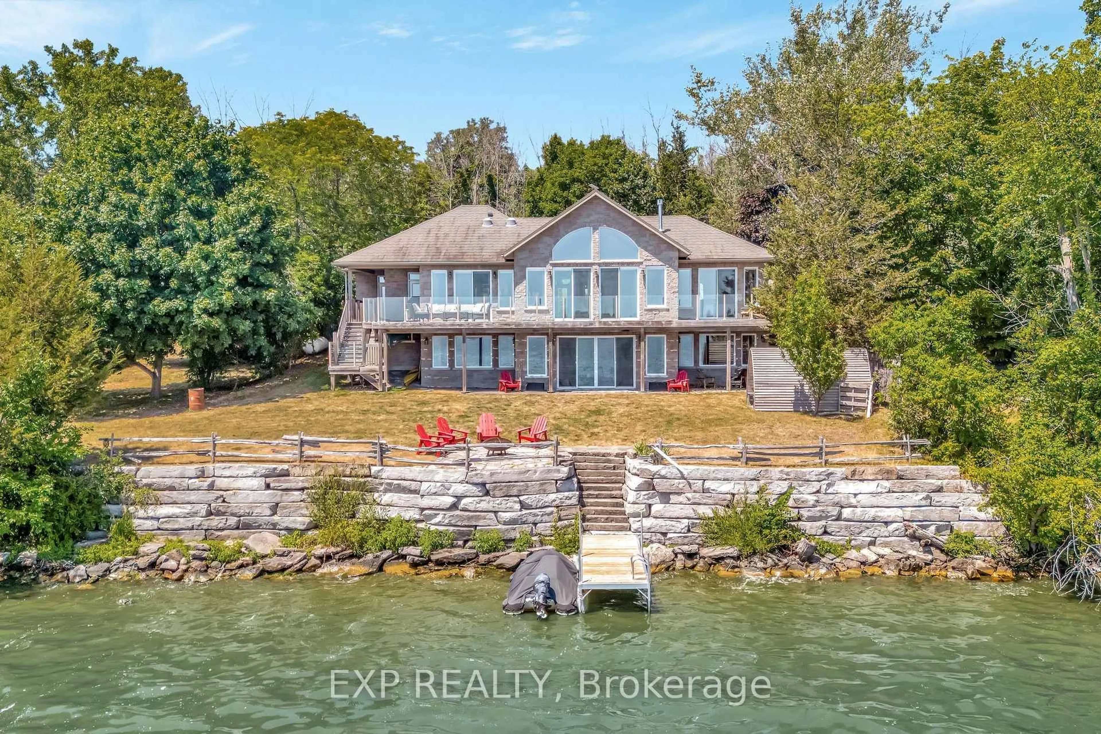 A pic from outside/outdoor area/front of a property/back of a property/a pic from drone, water/lake/river/ocean view for 30 Roblin Lane R. R. #2 Lane, Prince Edward County Ontario K0K 2T0