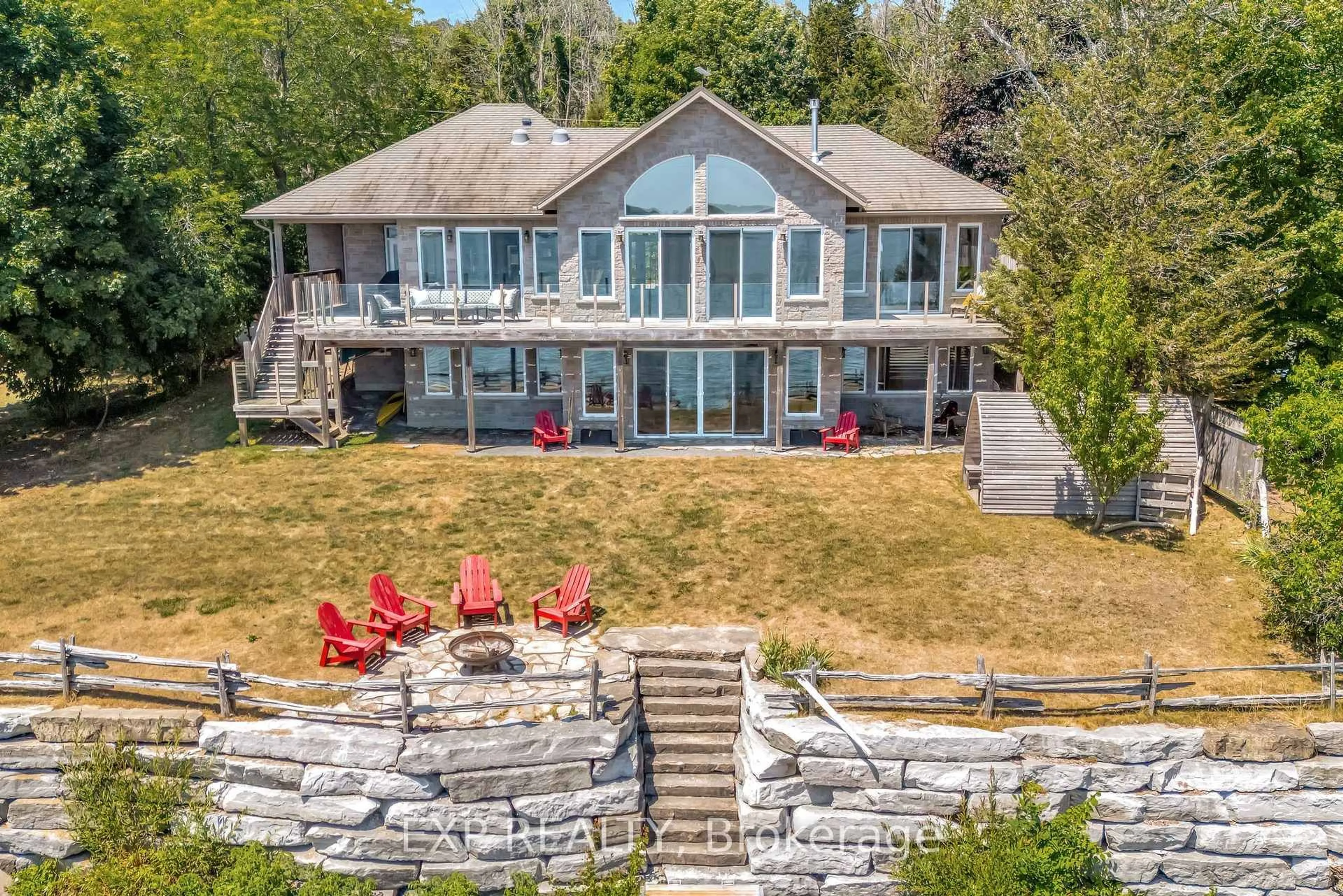 A pic from outside/outdoor area/front of a property/back of a property/a pic from drone, water/lake/river/ocean view for 30 Roblin Lane R. R. #2 Lane, Prince Edward County Ontario K0K 2T0