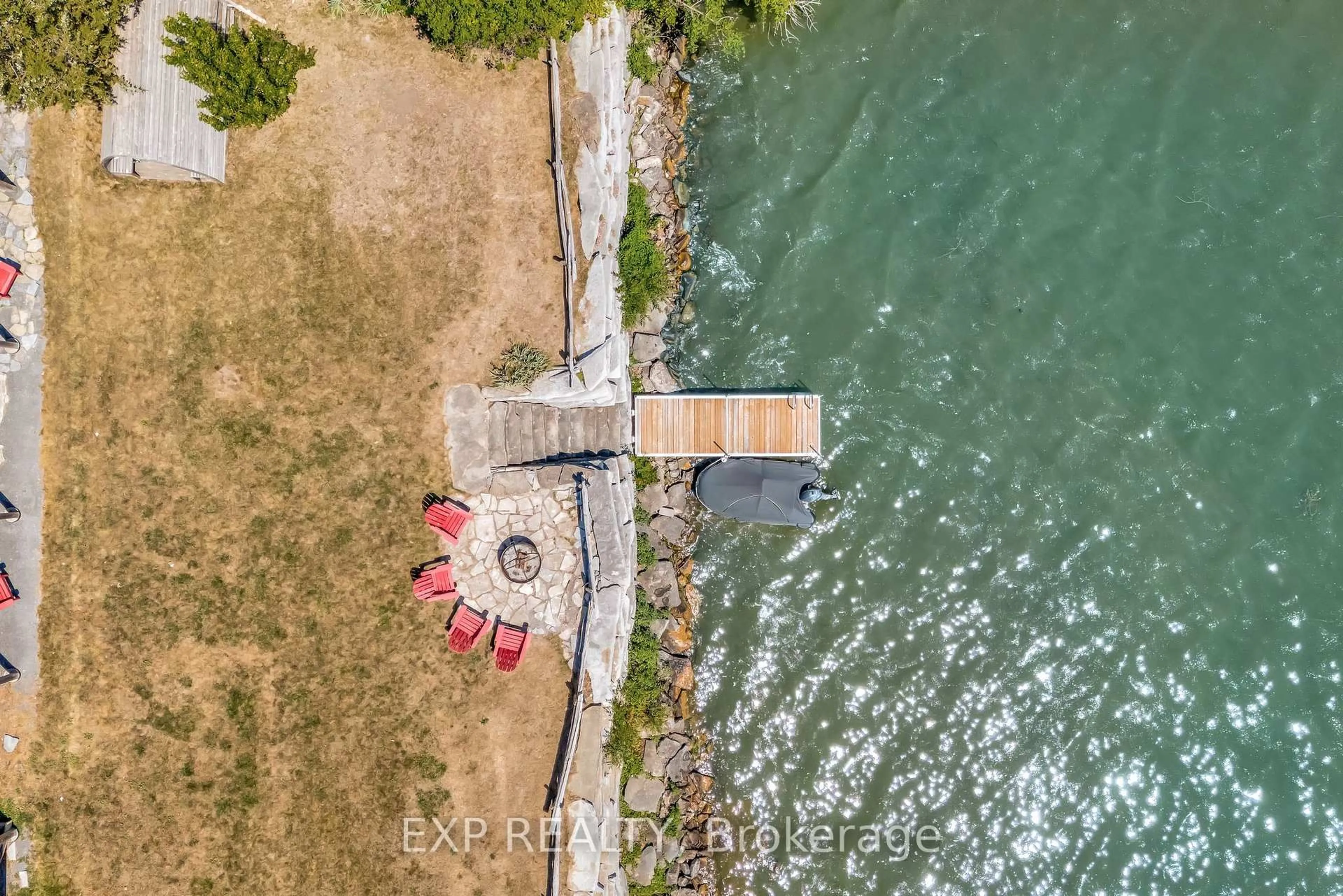 A pic from outside/outdoor area/front of a property/back of a property/a pic from drone, water/lake/river/ocean view for 30 Roblin Lane R. R. #2 Lane, Prince Edward County Ontario K0K 2T0