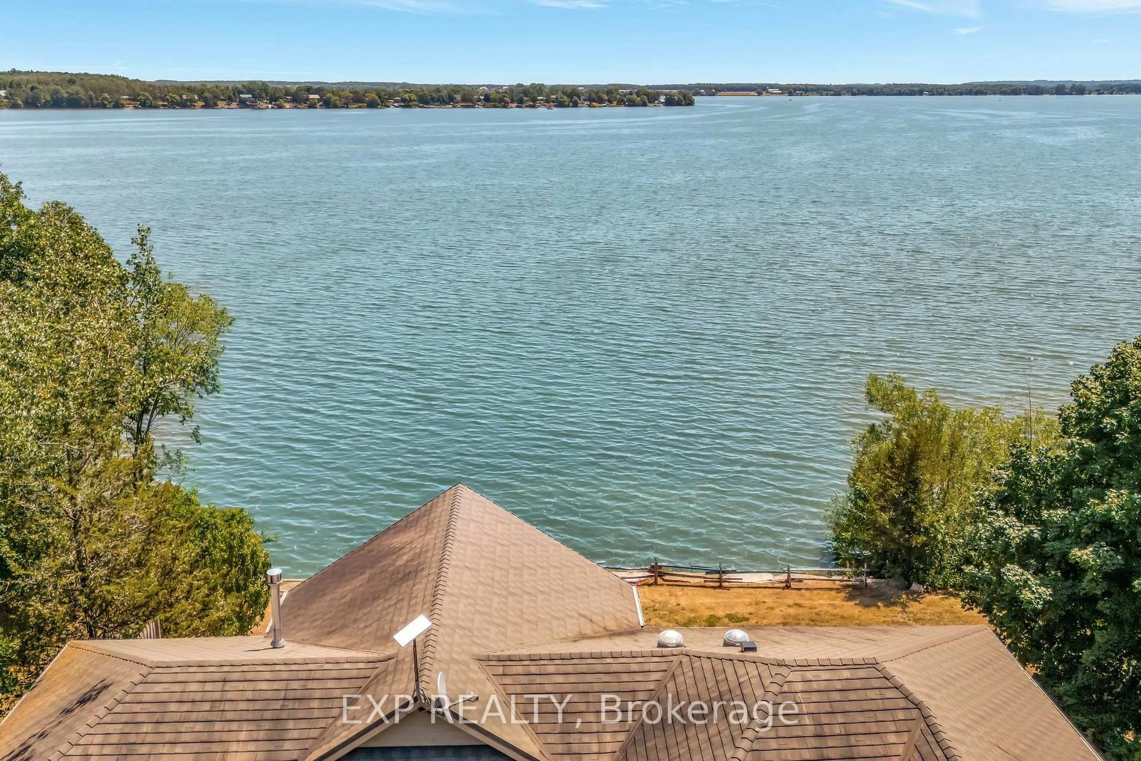 A pic from outside/outdoor area/front of a property/back of a property/a pic from drone, water/lake/river/ocean view for 30 Roblin Lane R. R. #2 Lane, Prince Edward County Ontario K0K 2T0