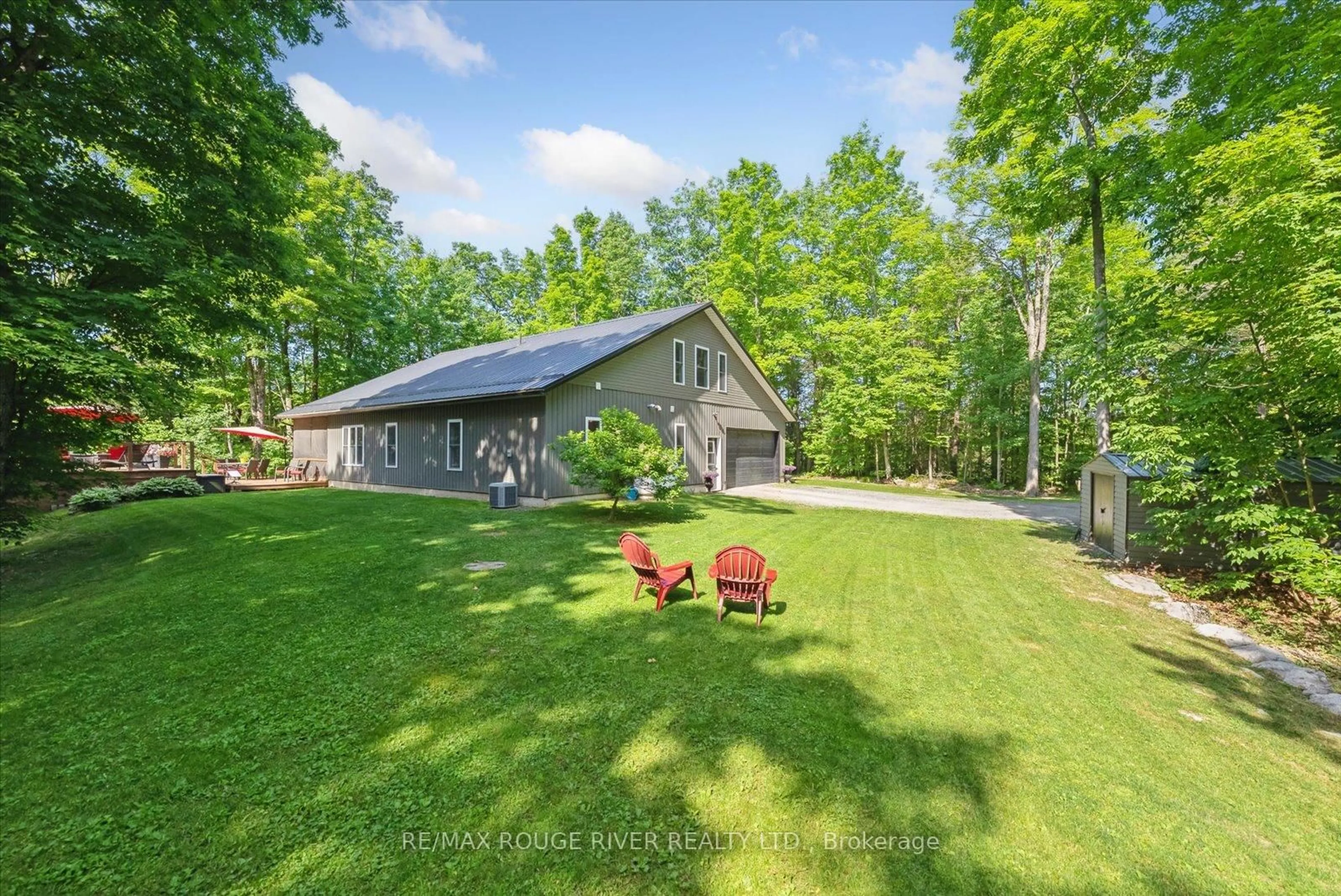 A pic from outside/outdoor area/front of a property/back of a property/a pic from drone, unknown for 36 Station Rd, Limoges Ontario K0K 2M0