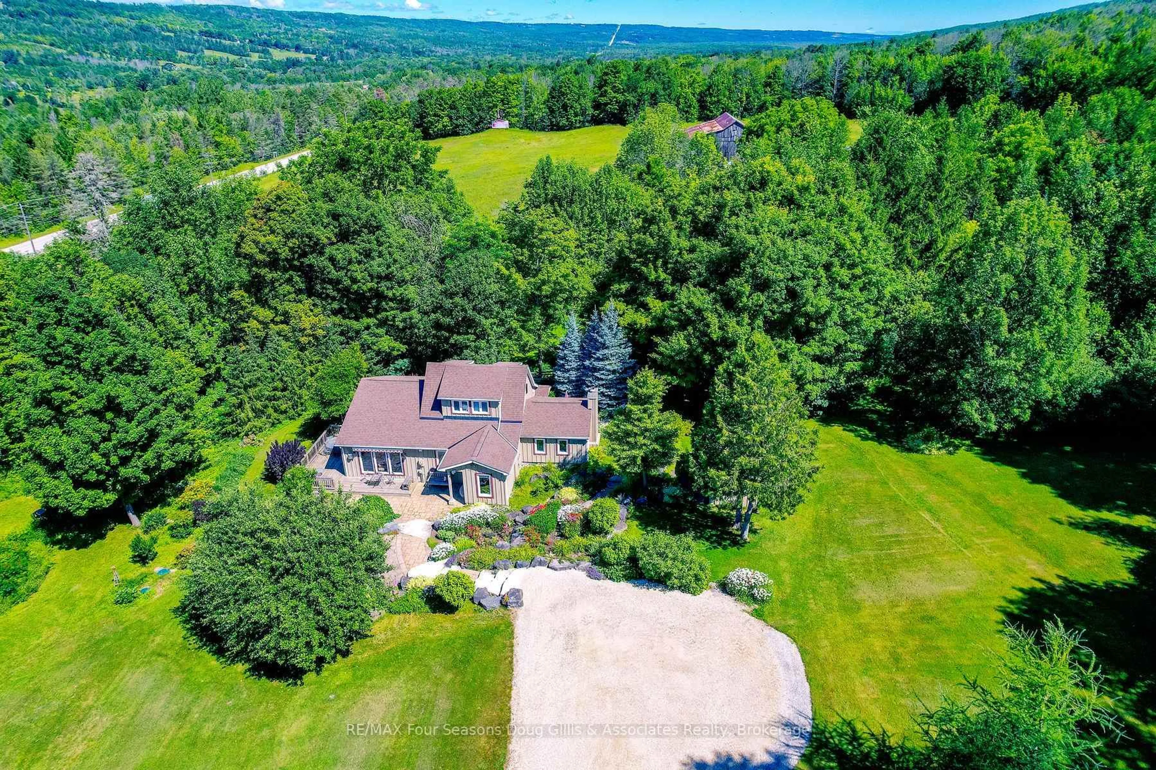 A pic from outside/outdoor area/front of a property/back of a property/a pic from drone, mountain view for 546287 4B Sdrd, Grey Highlands Ontario N0C 1G0