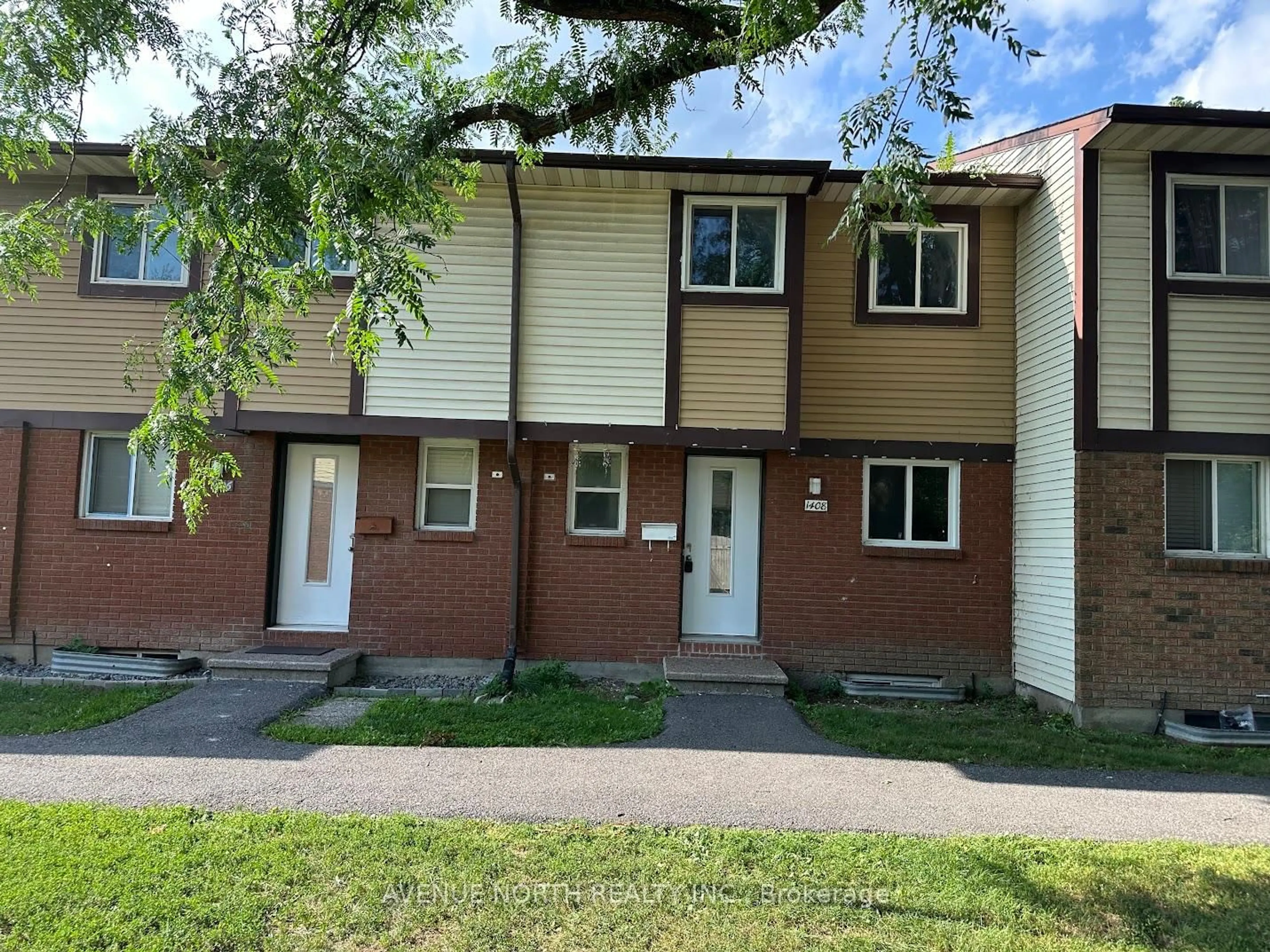 A pic from outside/outdoor area/front of a property/back of a property/a pic from drone, street for 1408 Foxwell St #3, Ottawa Ontario K1B 5J4