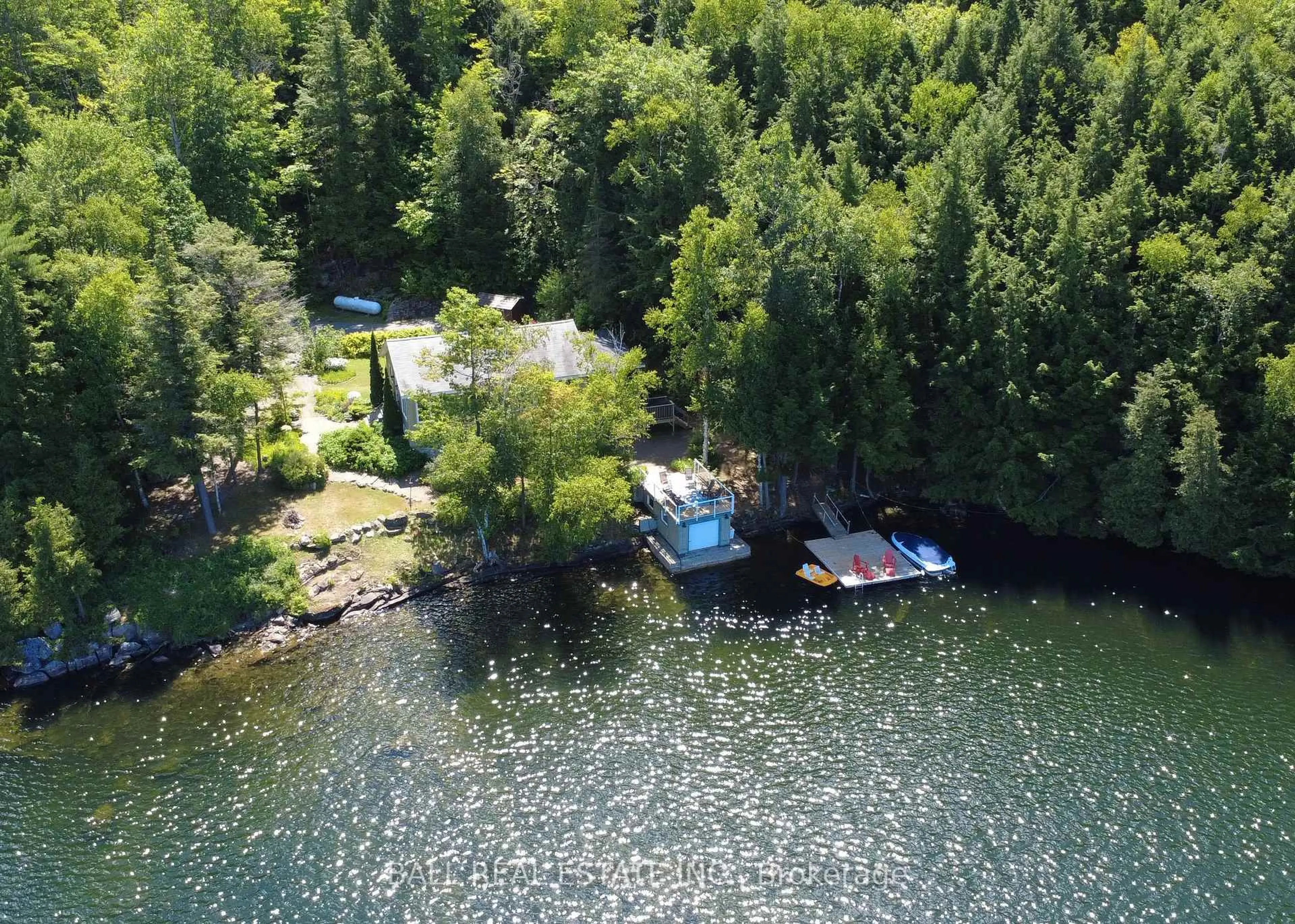 A pic from outside/outdoor area/front of a property/back of a property/a pic from drone, water/lake/river/ocean view for 55 Kingfisher Lane, North Kawartha Ontario K0L 1A0