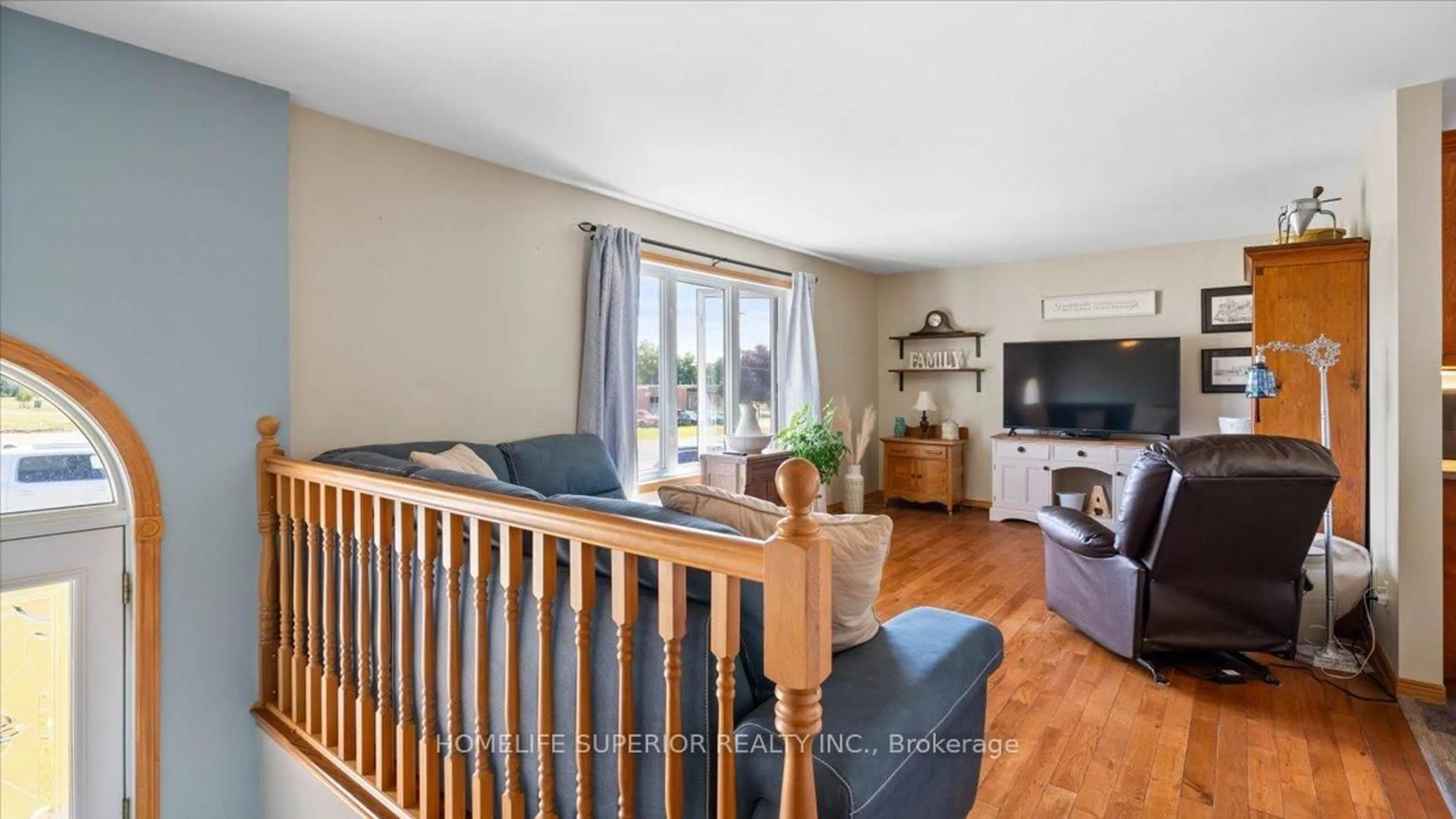 Living room with furniture, wood/laminate floor for 126 Newkirk Blvd, Bancroft Ontario K0L 1C0