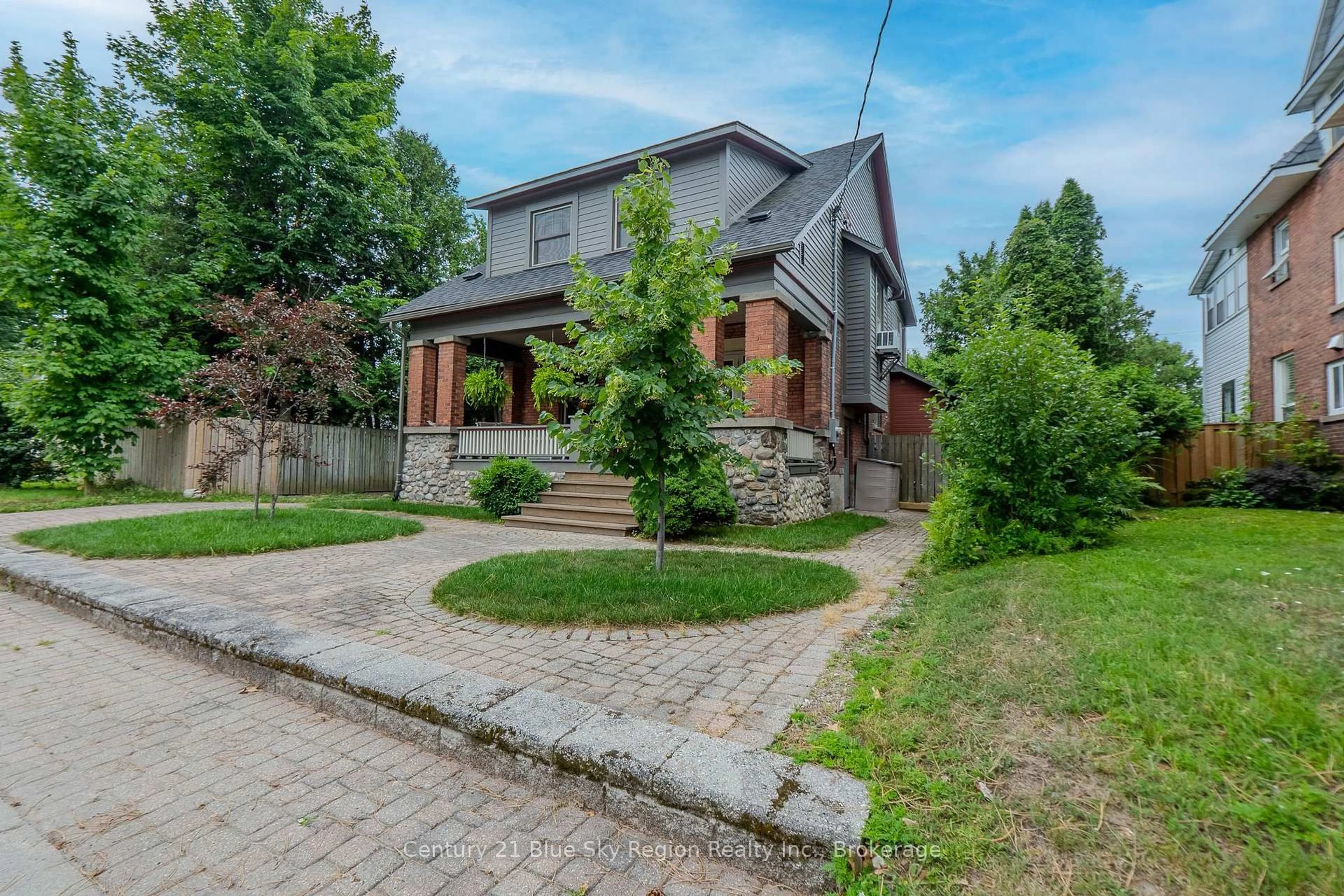 Home with brick exterior material, street for 871 Main St, North Bay Ontario P1B 2V8