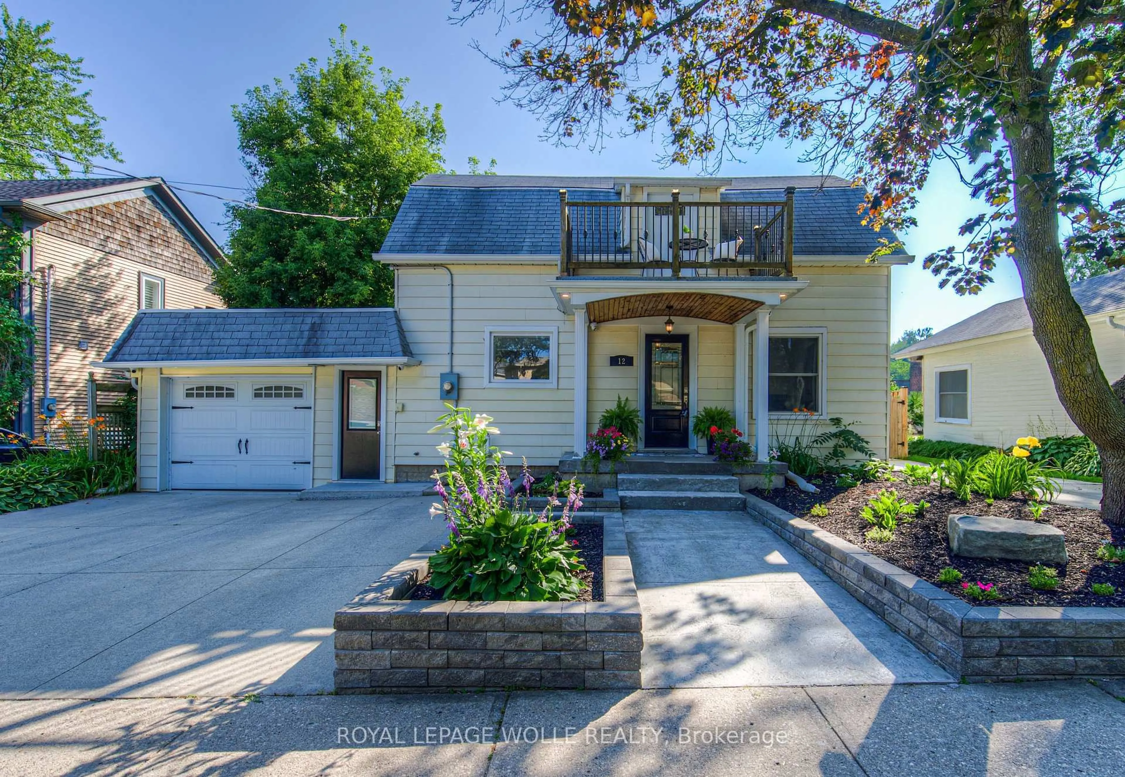 Home with brick exterior material, street for 12 Queen St, Wilmot Ontario N3A 2N1