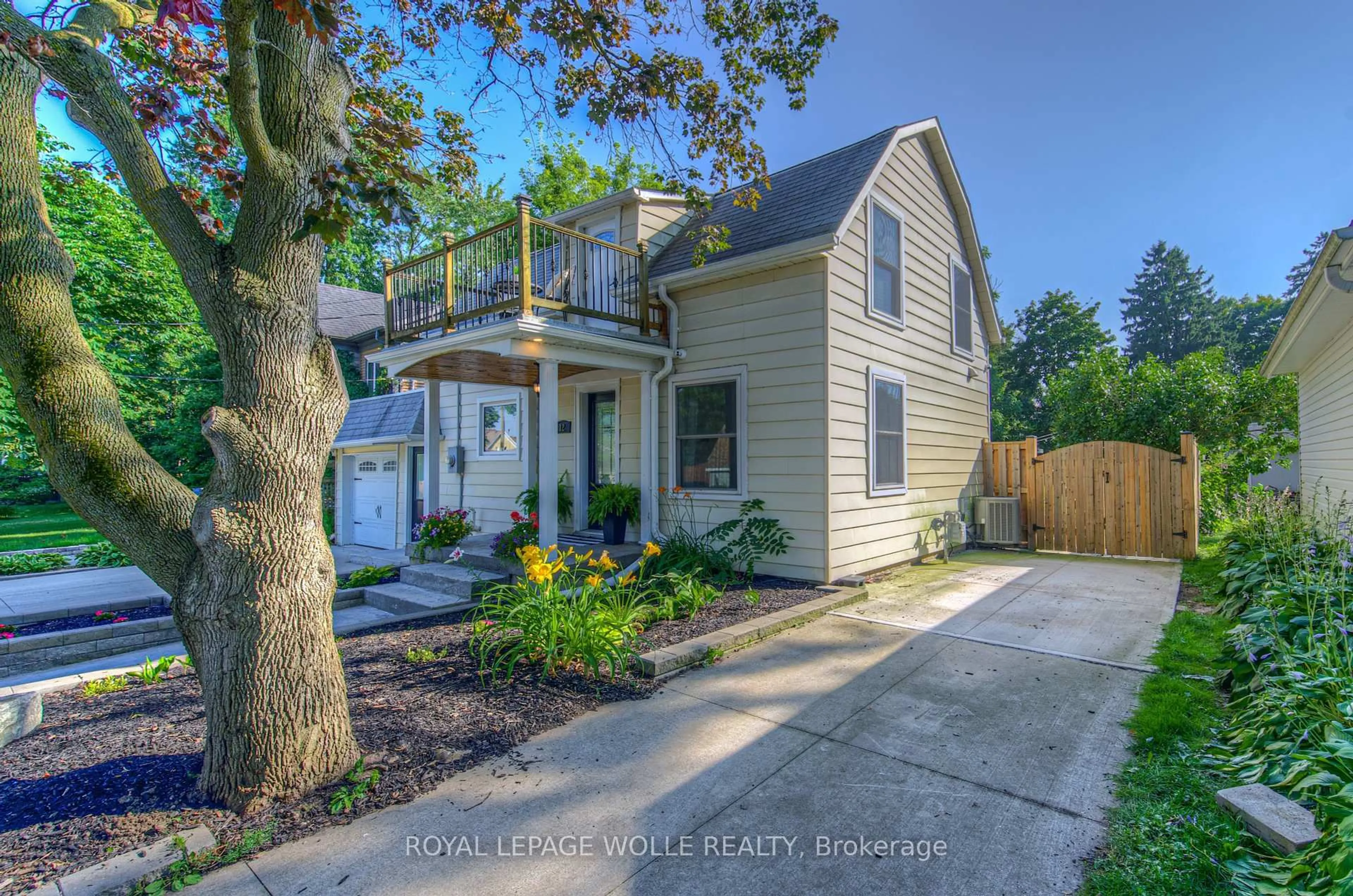 A pic from outside/outdoor area/front of a property/back of a property/a pic from drone, street for 12 Queen St, Wilmot Ontario N3A 2N1