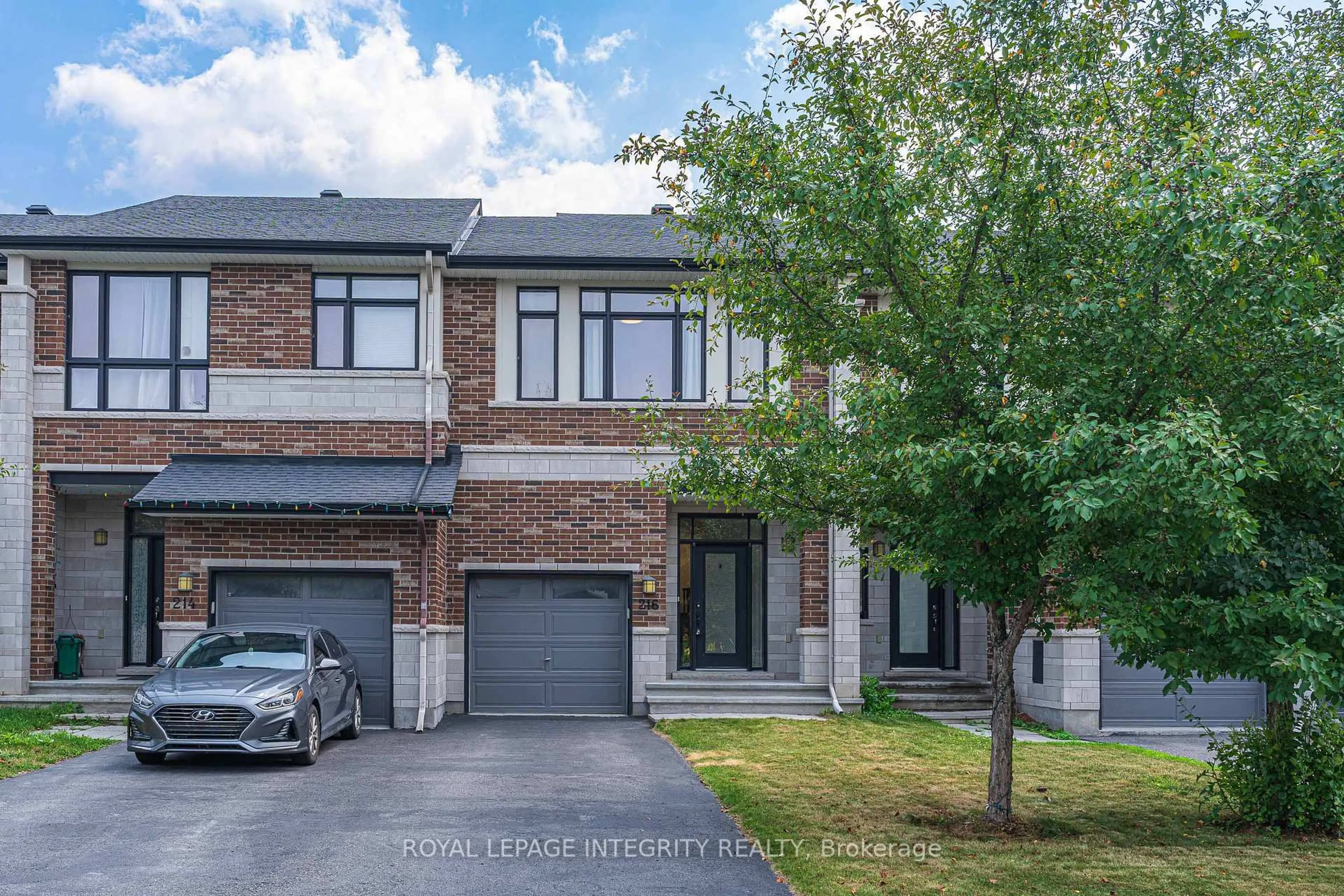 Home with brick exterior material, street for 216 Cooks Mill Cres, Ottawa Ontario K1V 2N1