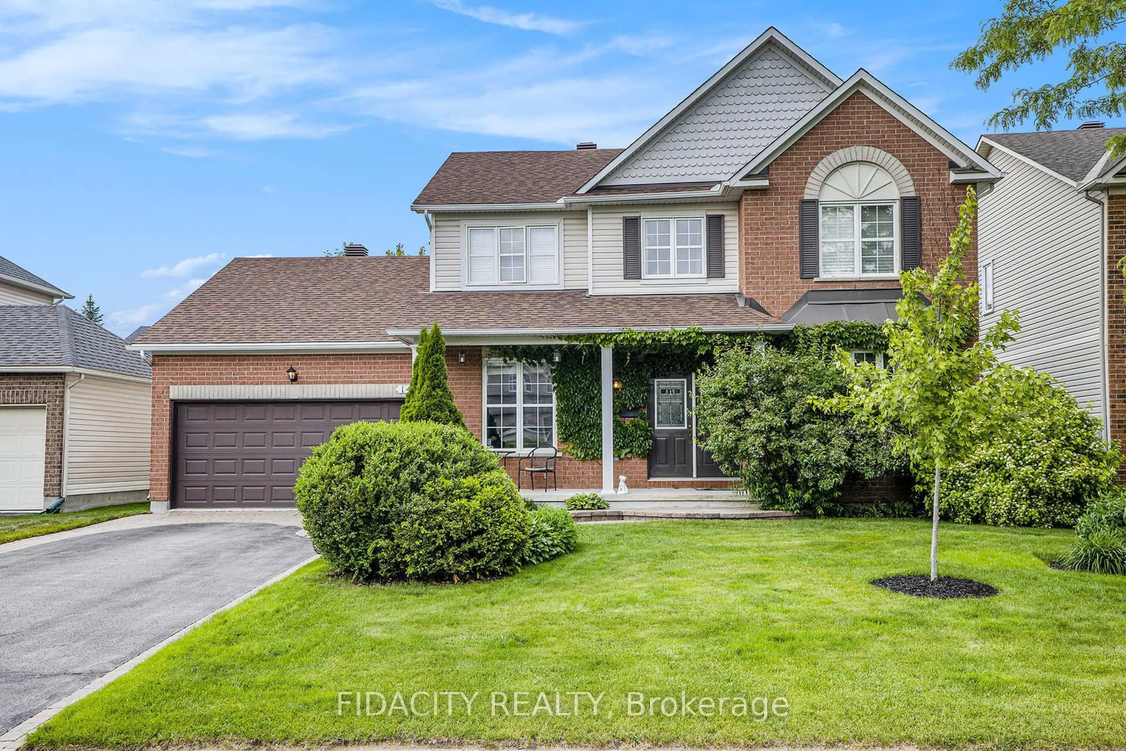 Home with brick exterior material, street for 14 Franklin Cathcart Cres, Stittsville Ontario K2S 2A7