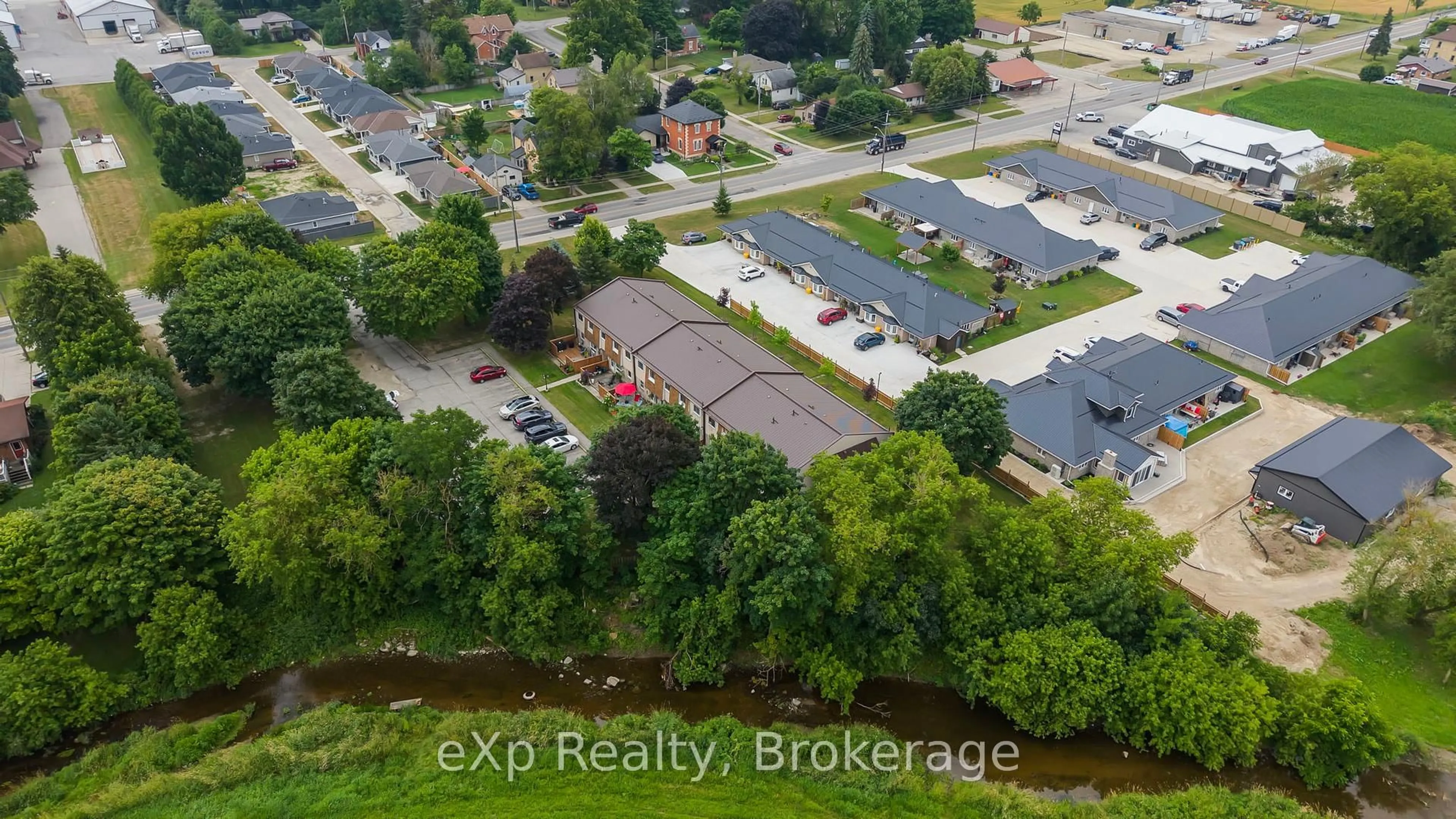 A pic from outside/outdoor area/front of a property/back of a property/a pic from drone, street for 100 Arthur St #6, Minto Ontario N0G 1Z0