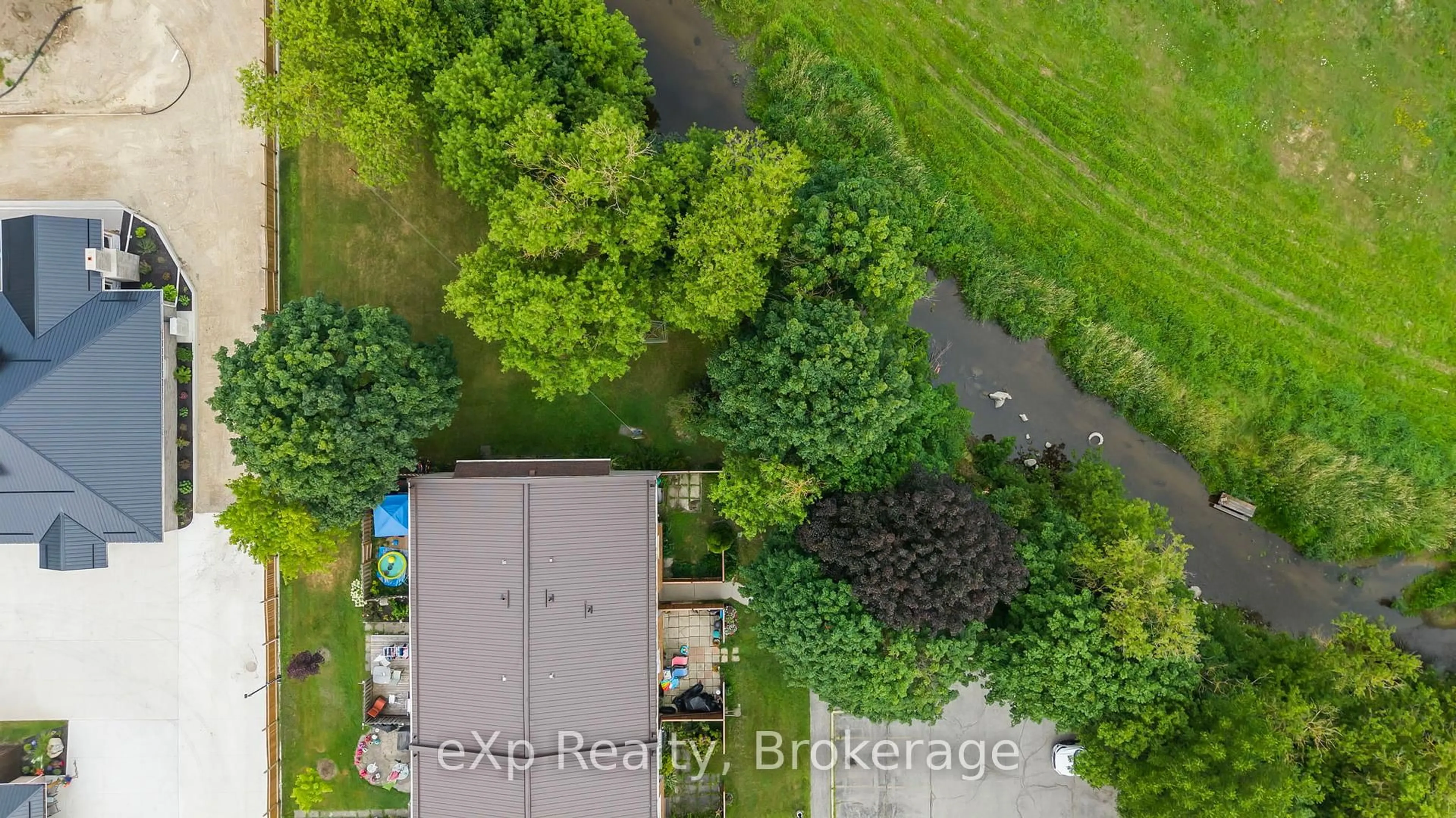 A pic from outside/outdoor area/front of a property/back of a property/a pic from drone, water/lake/river/ocean view for 100 Arthur St #6, Minto Ontario N0G 1Z0