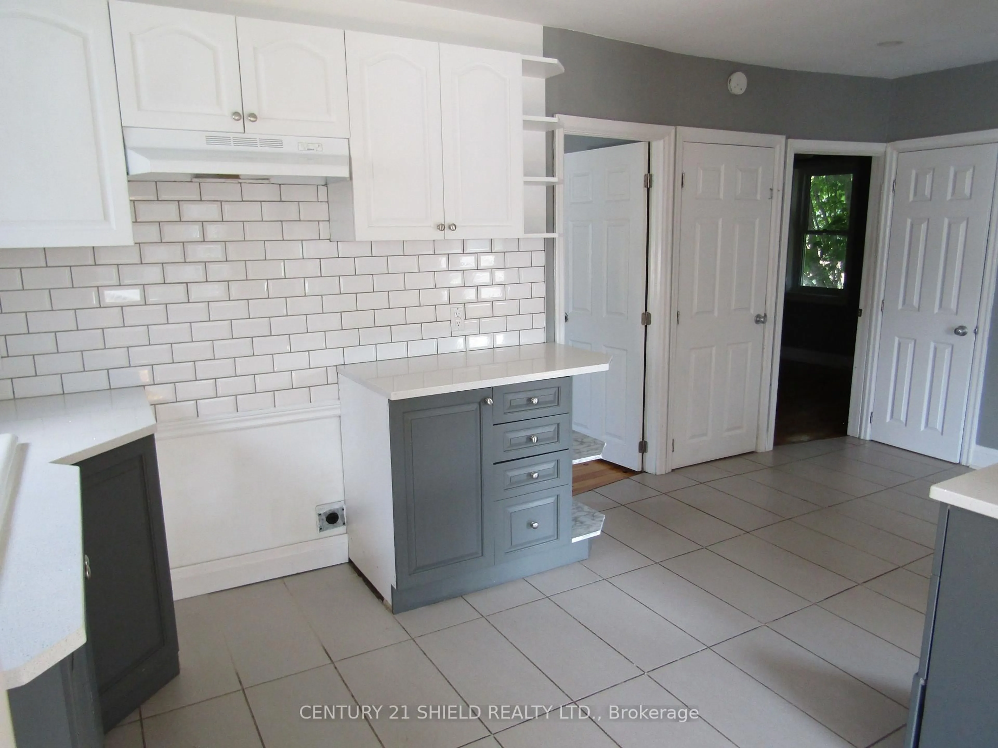 Open concept kitchen, ceramic/tile floor for 513 Fourth St, Cornwall Ontario K6H 2J7