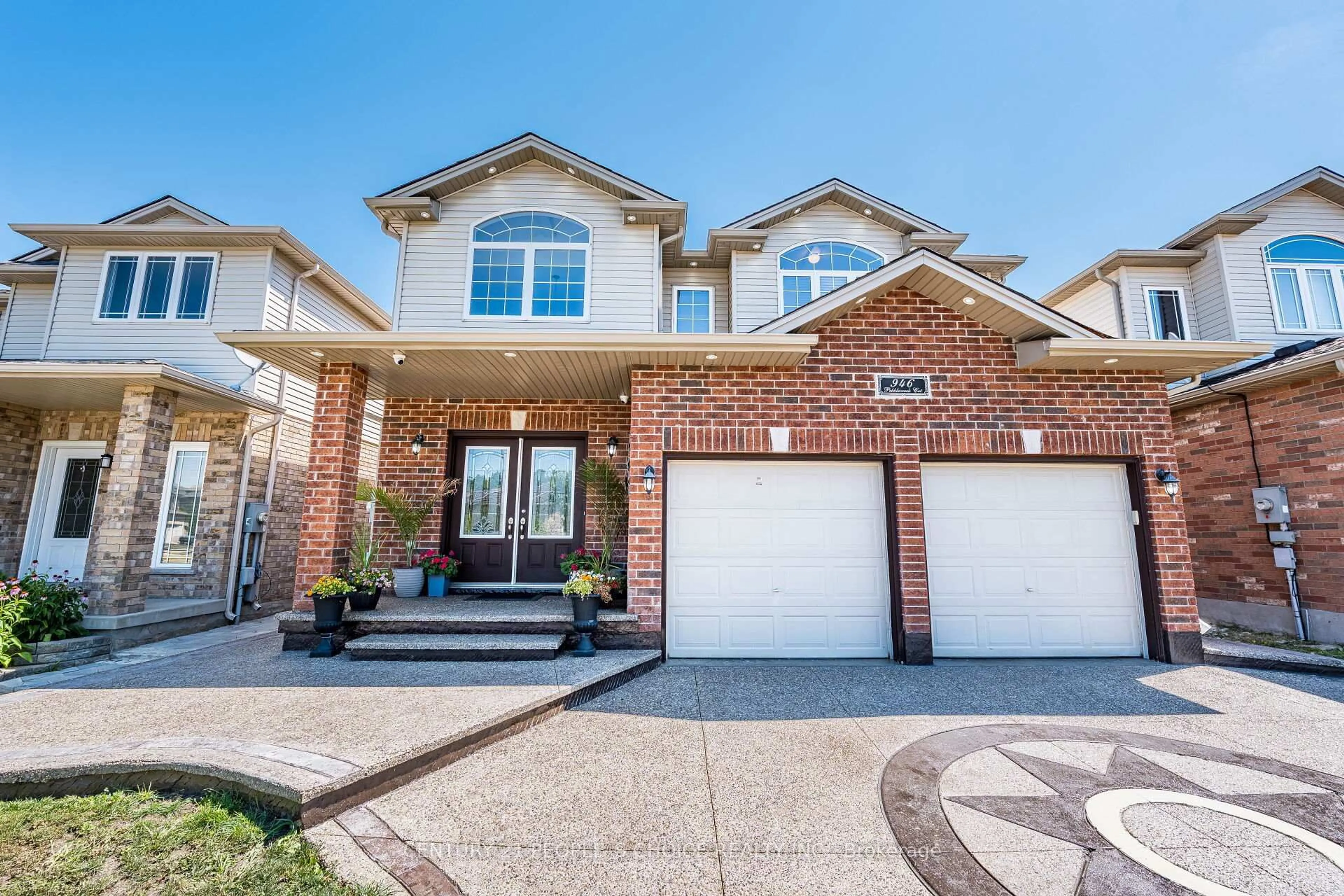 Home with brick exterior material, street for 946 Pebblecreek Crt, Kitchener Ontario N2A 0C5