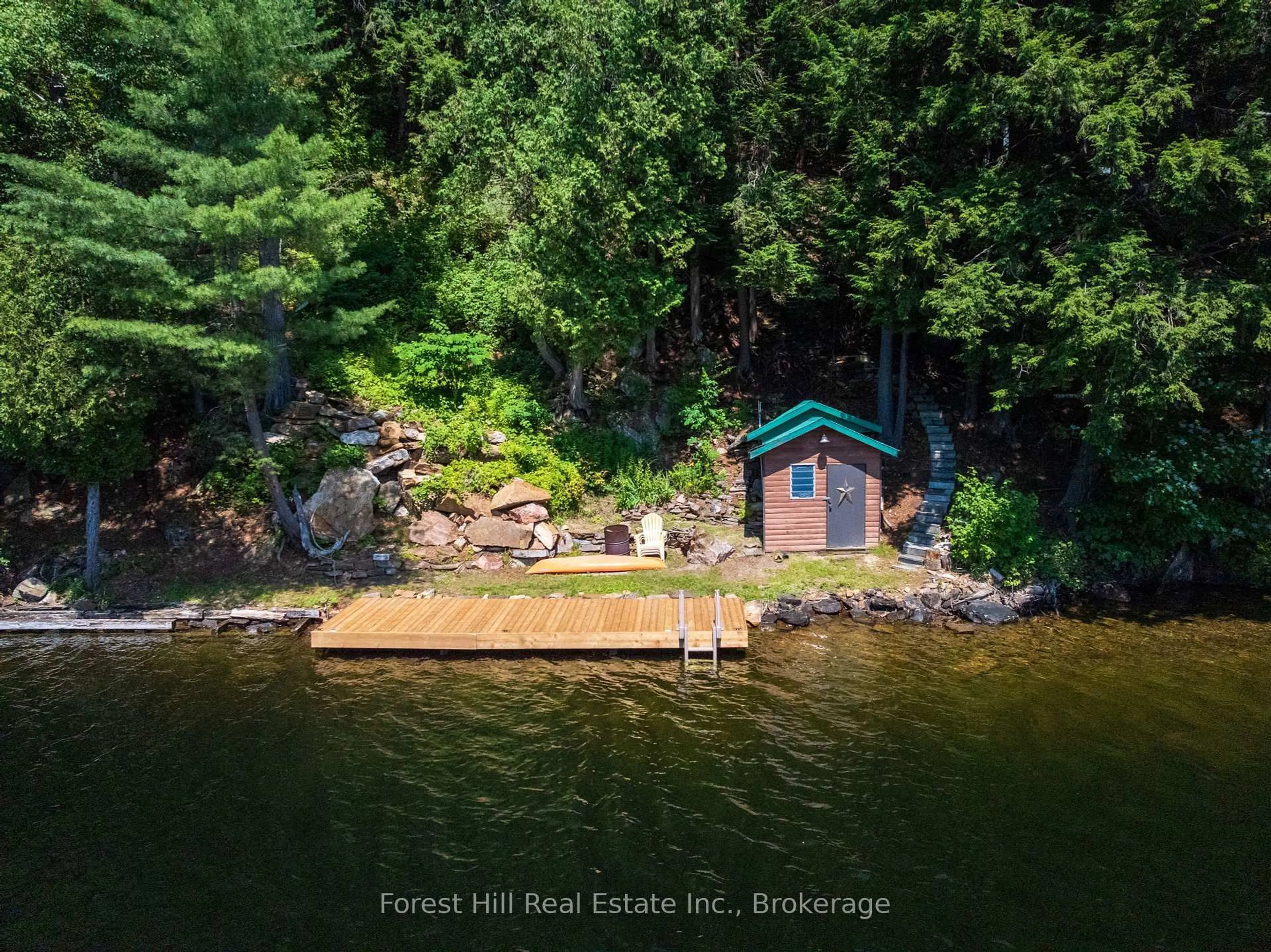 A pic from outside/outdoor area/front of a property/back of a property/a pic from drone, water/lake/river/ocean view for 1289 Delbrooke Rd, Lake of Bays Ontario P0A 1H0