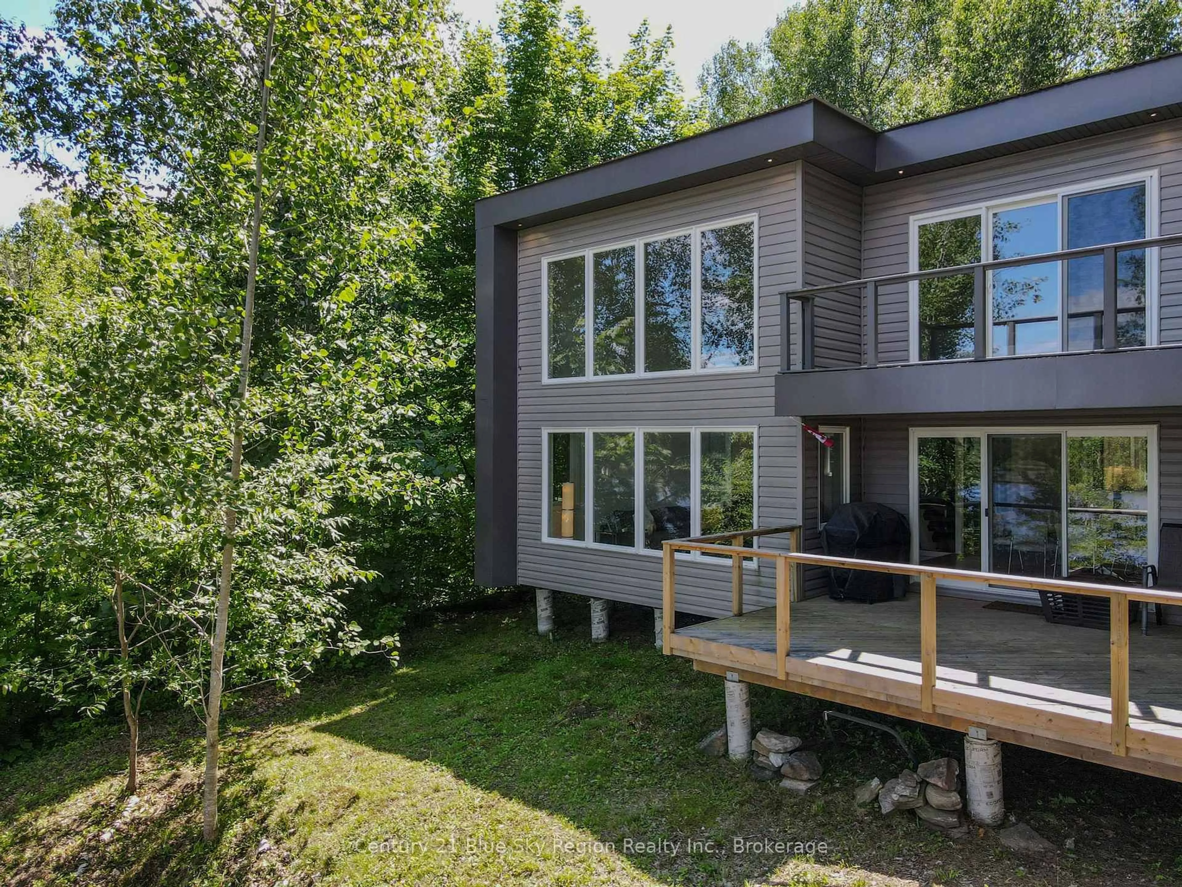 Home with vinyl exterior material, forest/trees view for 21 Jack's Lake, Parry Sound Remote Area Ontario P0H 1N0
