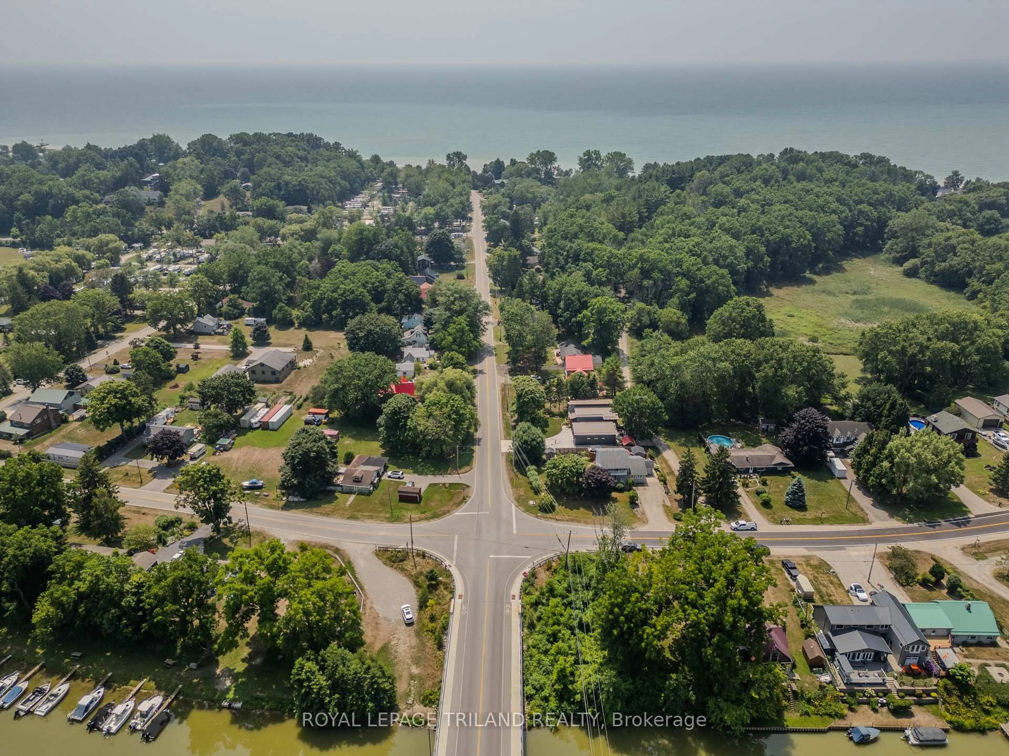 A pic from outside/outdoor area/front of a property/back of a property/a pic from drone, water/lake/river/ocean view for 49345 DEXTER Line, Malahide Ontario N5H 2R2