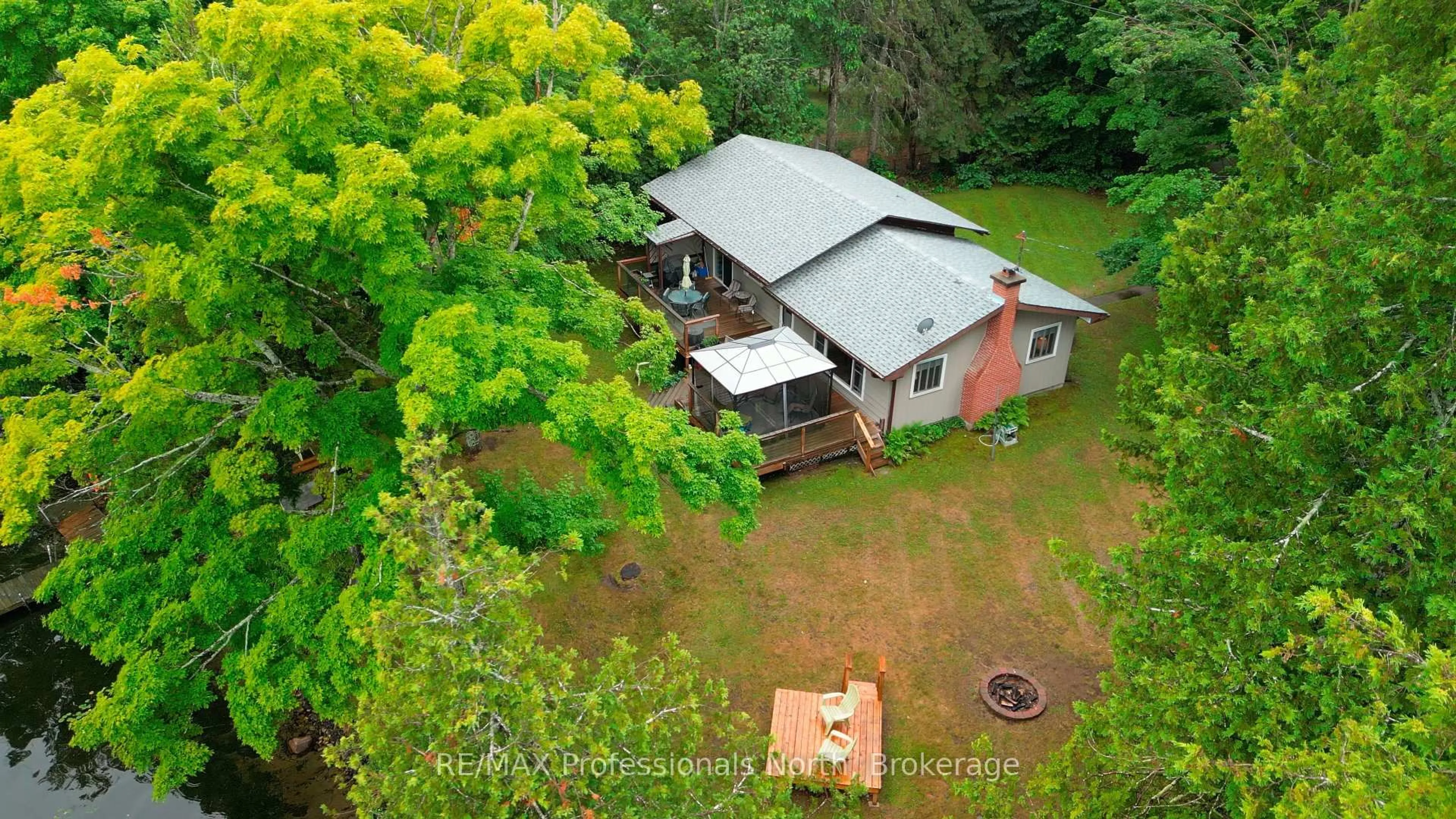 A pic from outside/outdoor area/front of a property/back of a property/a pic from drone, building for 1582 Hospitality Lake Rd, Minden Hills Ontario K0M 2K0