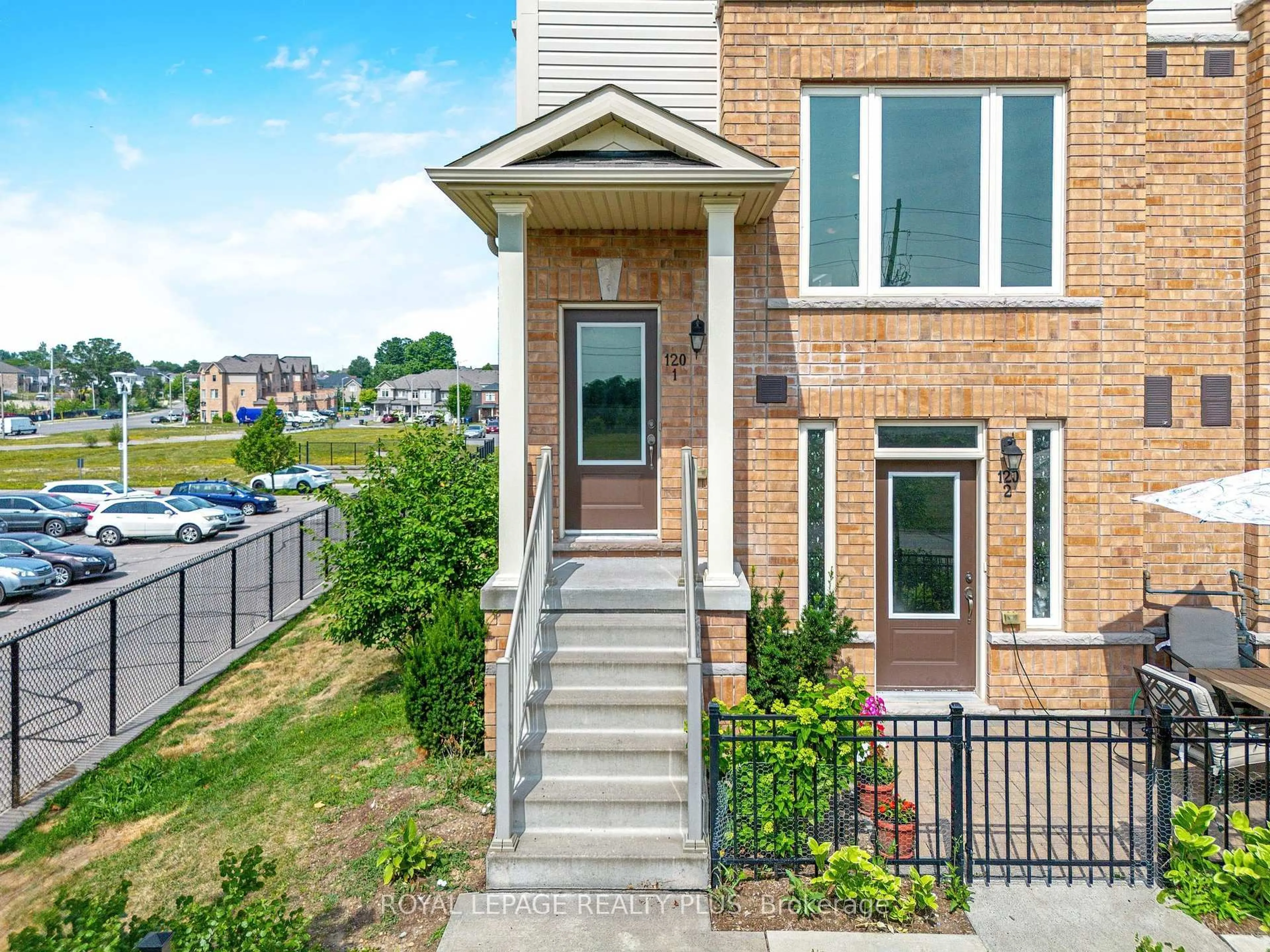 Home with brick exterior material, street for 120 Watson Pkwy #1, Guelph Ontario N1E 0P6