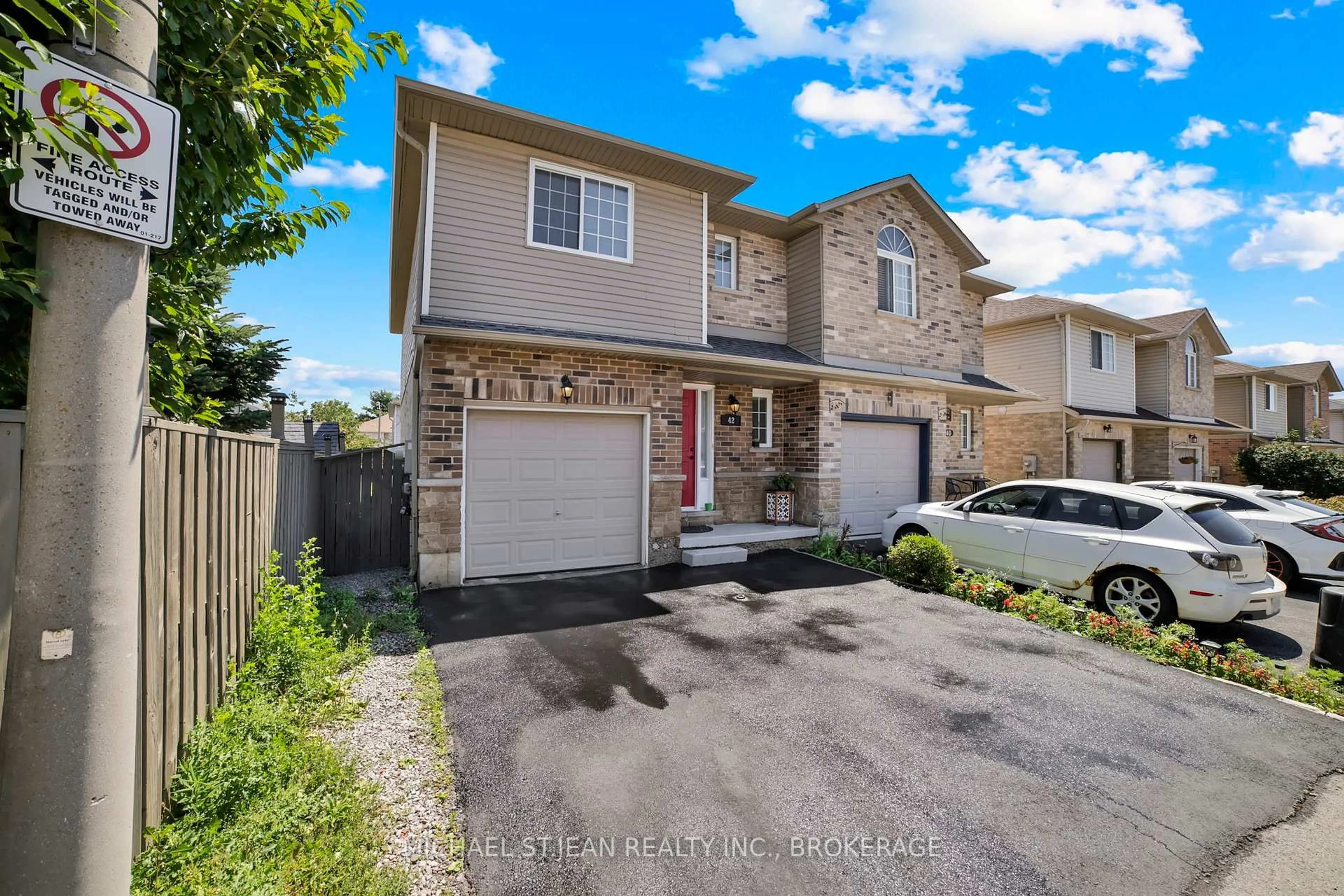A pic from outside/outdoor area/front of a property/back of a property/a pic from drone, street for 42 Vennio Lane, Hamilton Ontario L9B 2Y6