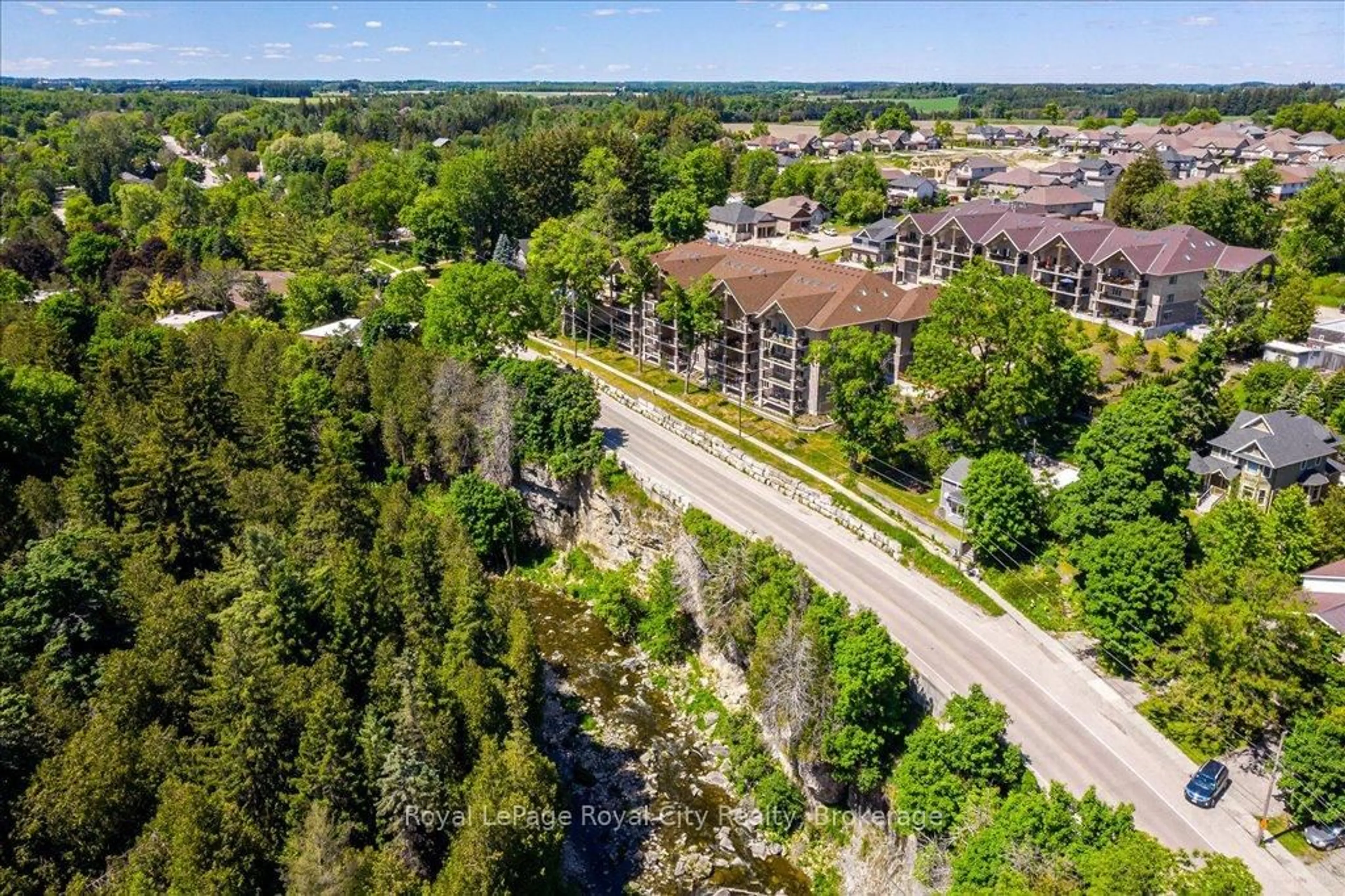 A pic from outside/outdoor area/front of a property/back of a property/a pic from drone, unknown for 19 Stumpf St #103, Centre Wellington Ontario N0B 1S0