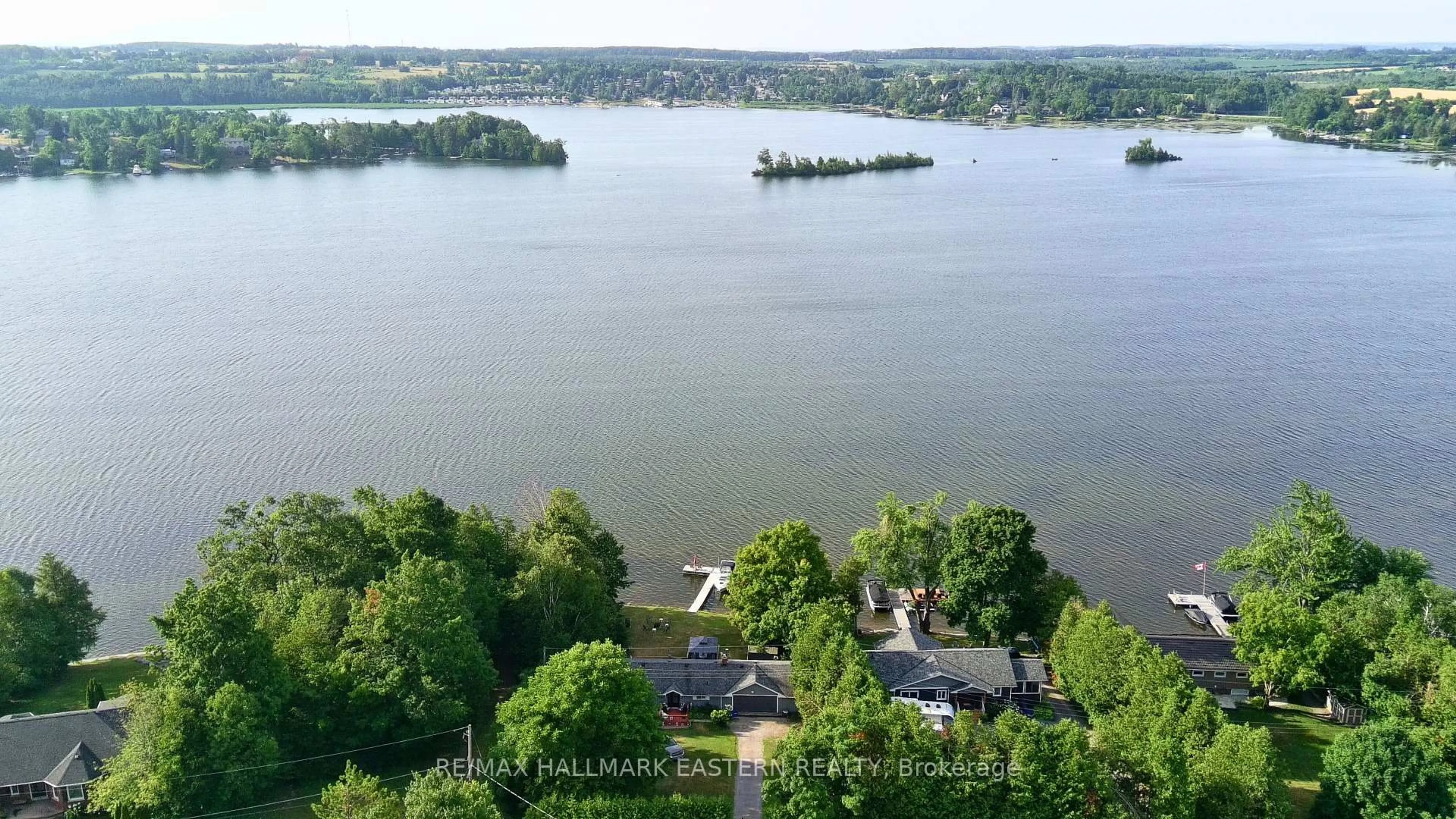 A pic from outside/outdoor area/front of a property/back of a property/a pic from drone, water/lake/river/ocean view for 51 Darling Dr, Selwyn Ontario K0L 2W0