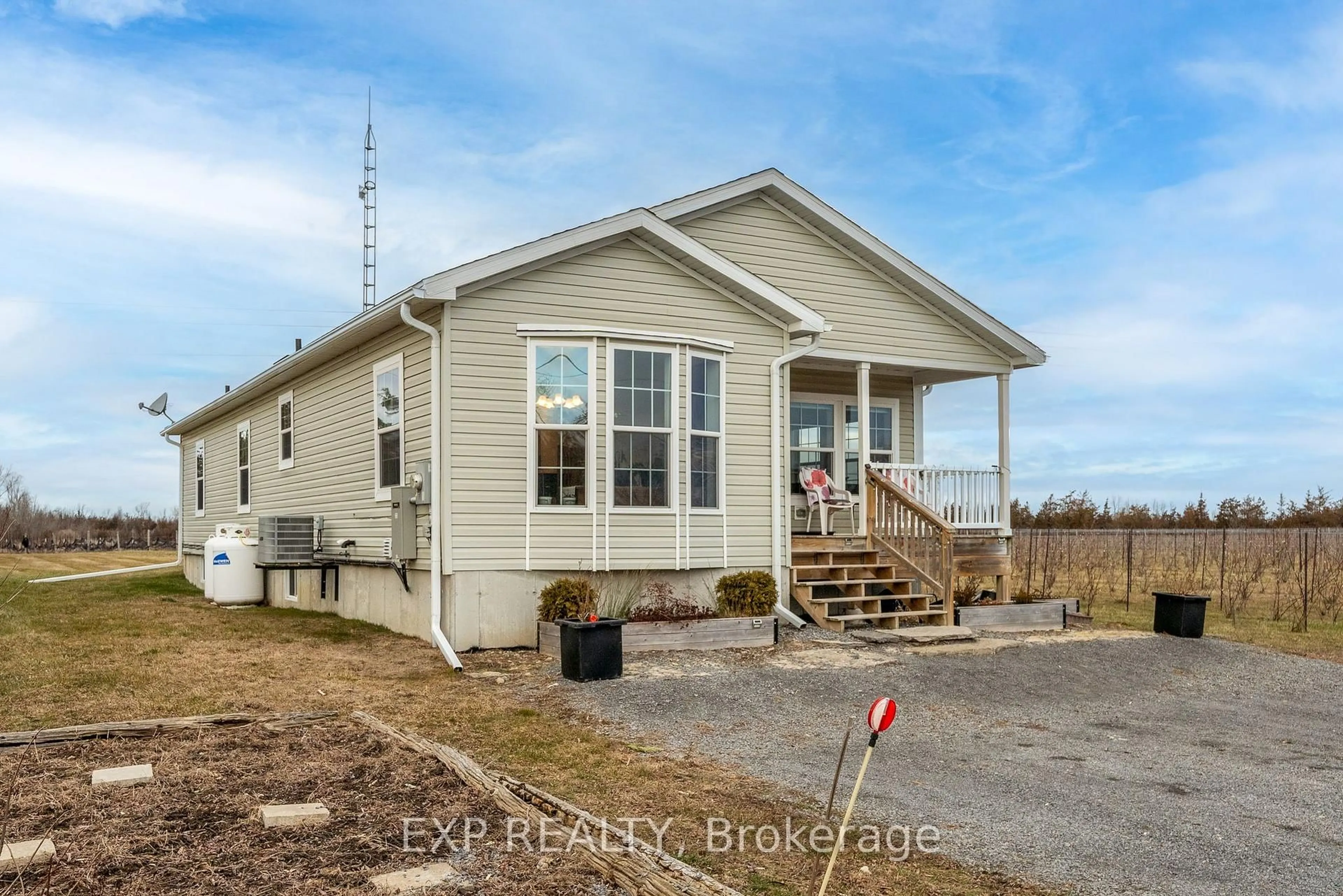 Home with vinyl exterior material, building for 3589 County Road 8, Prince Edward County Ontario K0K 2T0