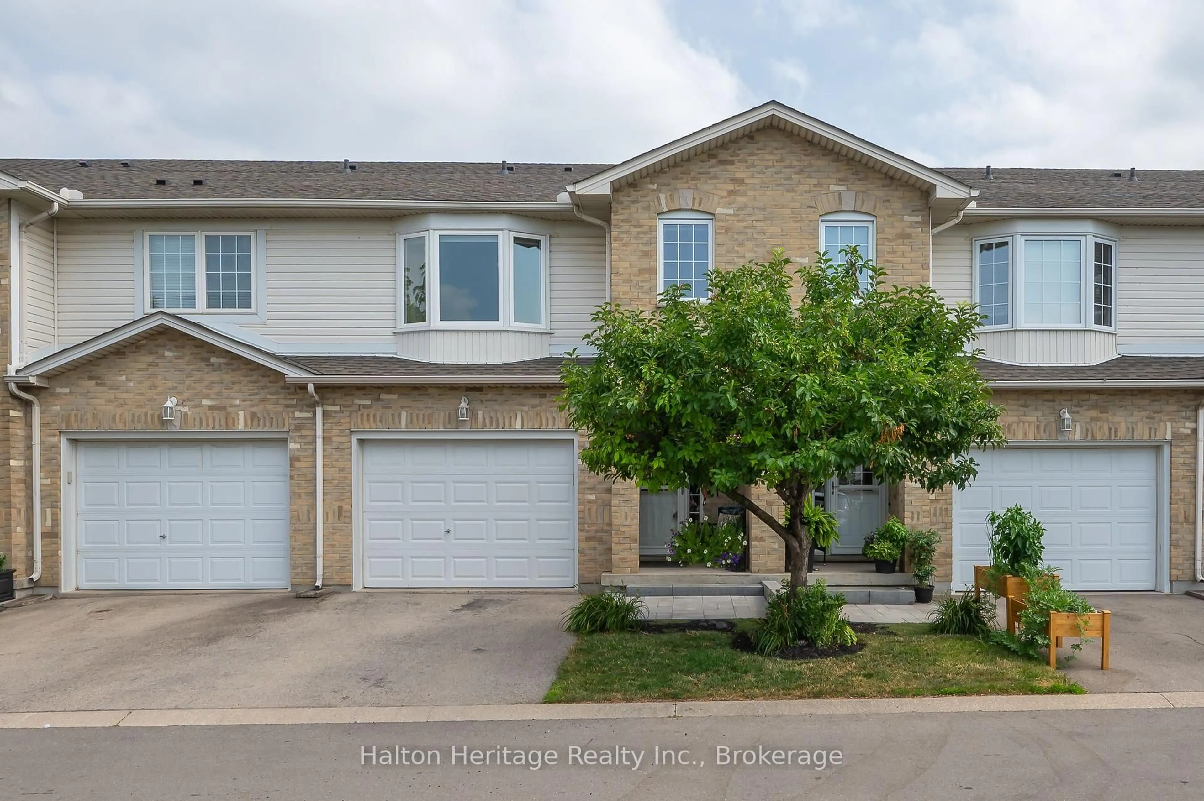 A pic from outside/outdoor area/front of a property/back of a property/a pic from drone, street for 485 Green Rd #67, Hamilton Ontario L8G 2Z9