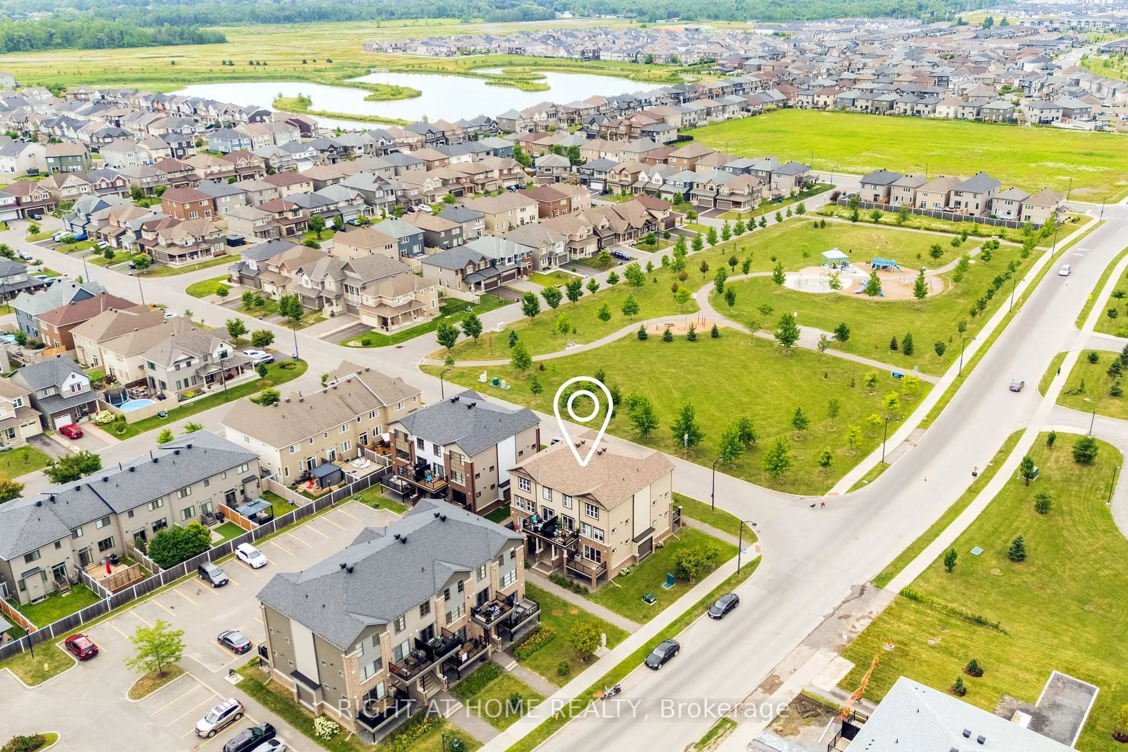 A pic from outside/outdoor area/front of a property/back of a property/a pic from drone, street for 308 Des Tilleuls Private #A, Ottawa Ontario K4A 1B7