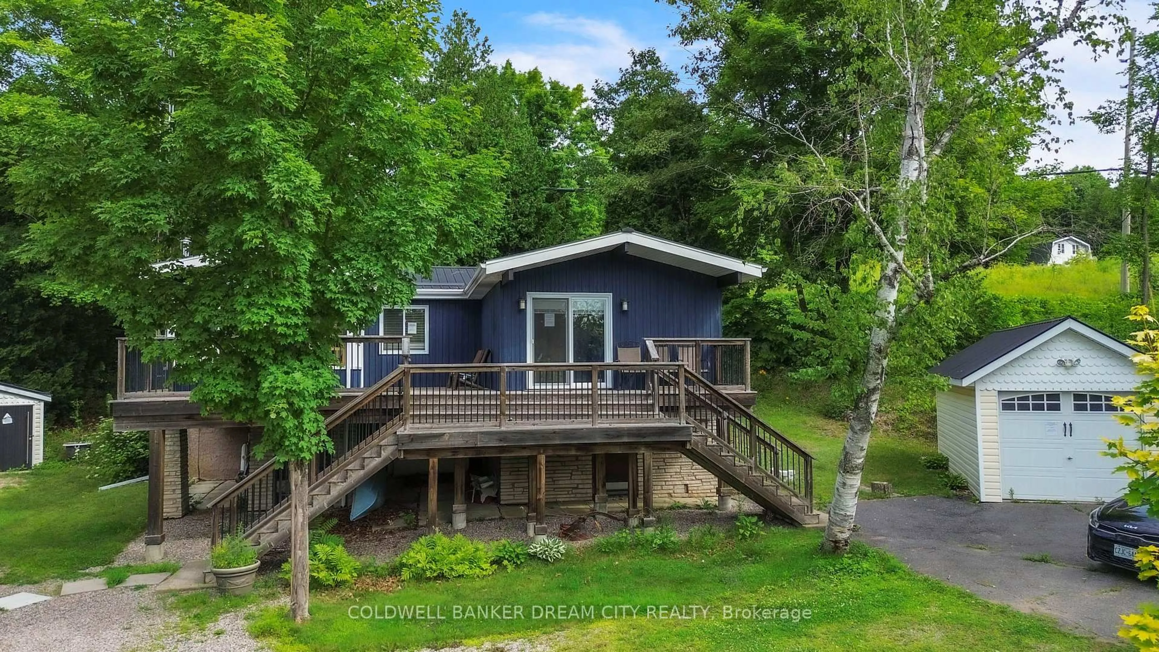 A pic from outside/outdoor area/front of a property/back of a property/a pic from drone, water/lake/river/ocean view for 1004A ALMOND Lane, Arden Ontario K0H 1B0