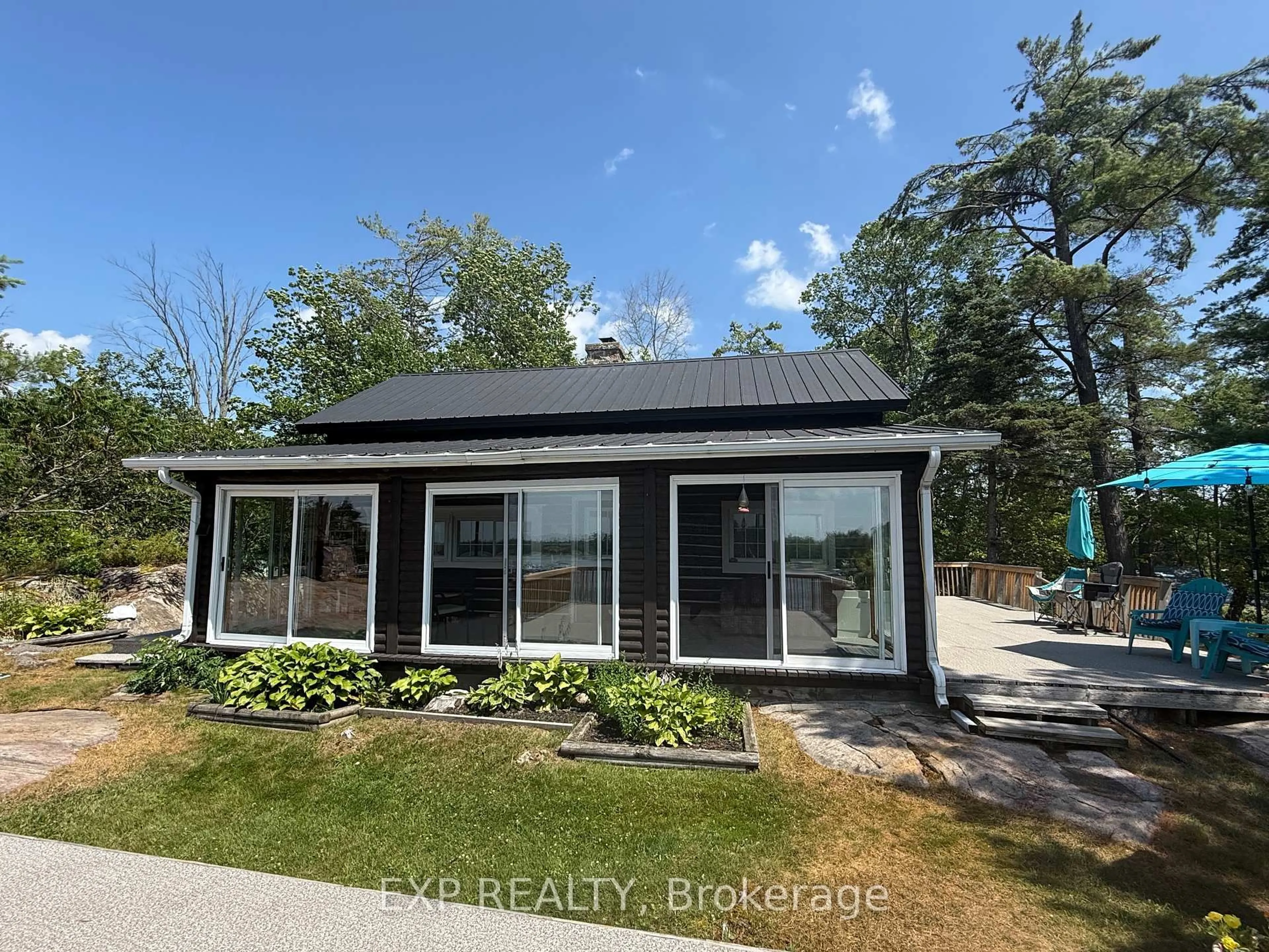 A pic from outside/outdoor area/front of a property/back of a property/a pic from drone, street for 91A Tobys Rd, Georgian Bay Ontario L0K 1S0