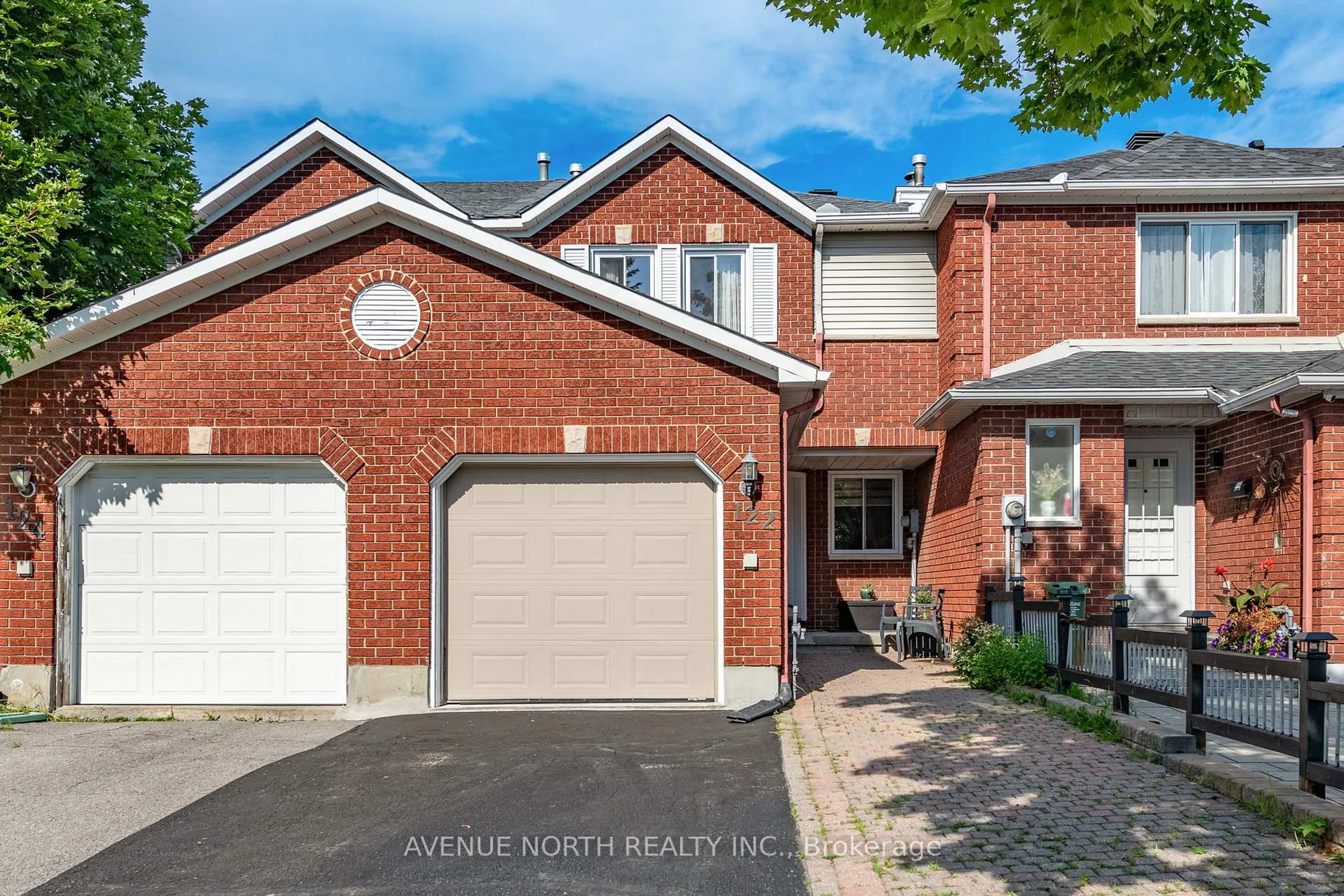 Home with brick exterior material, street for 122 Woodbury Cres, Ottawa Ontario K2J 3M2