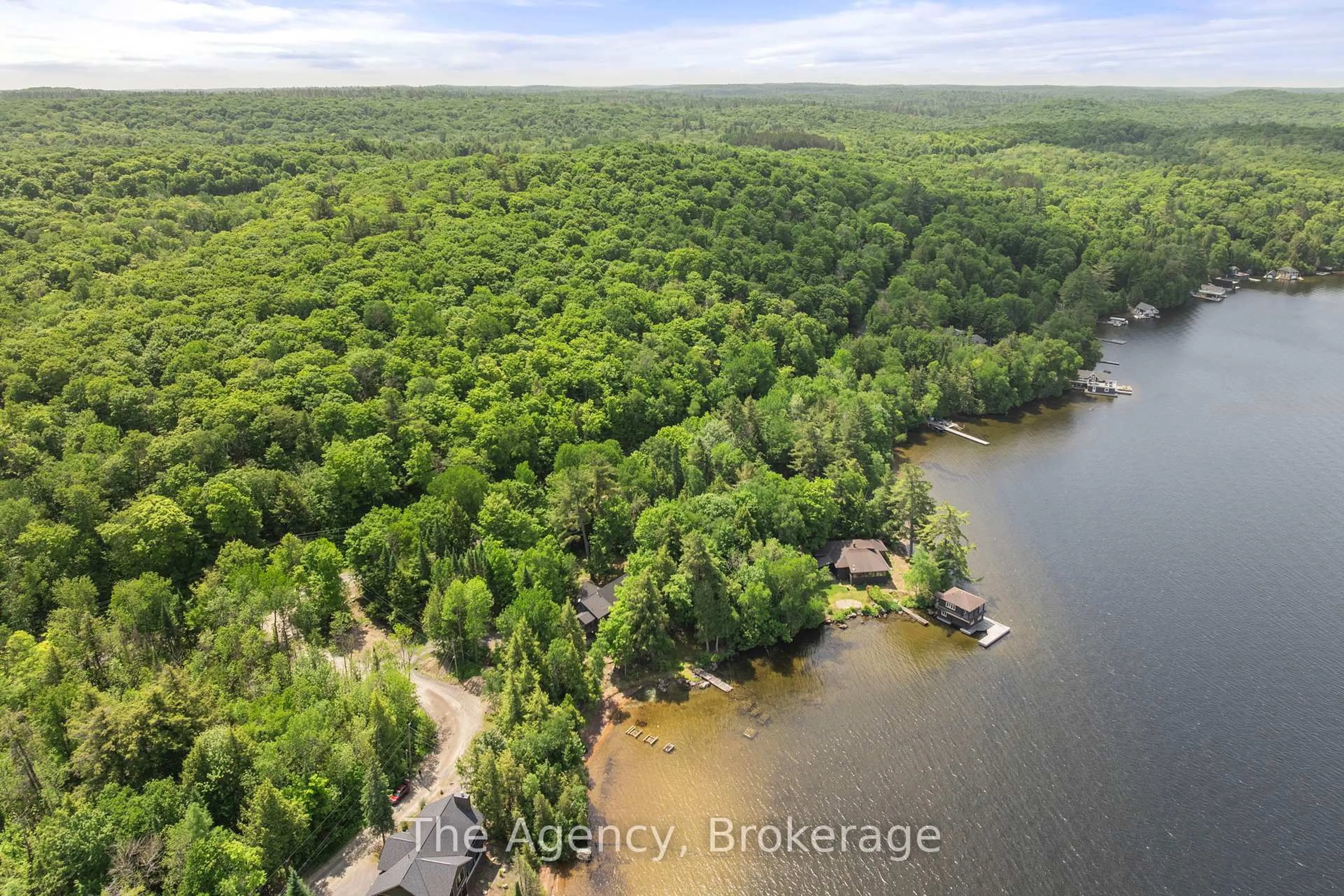 A pic from outside/outdoor area/front of a property/back of a property/a pic from drone, water/lake/river/ocean view for 1009 Scotts Boathouse Rd, Lake of Bays Ontario P0B 1A0
