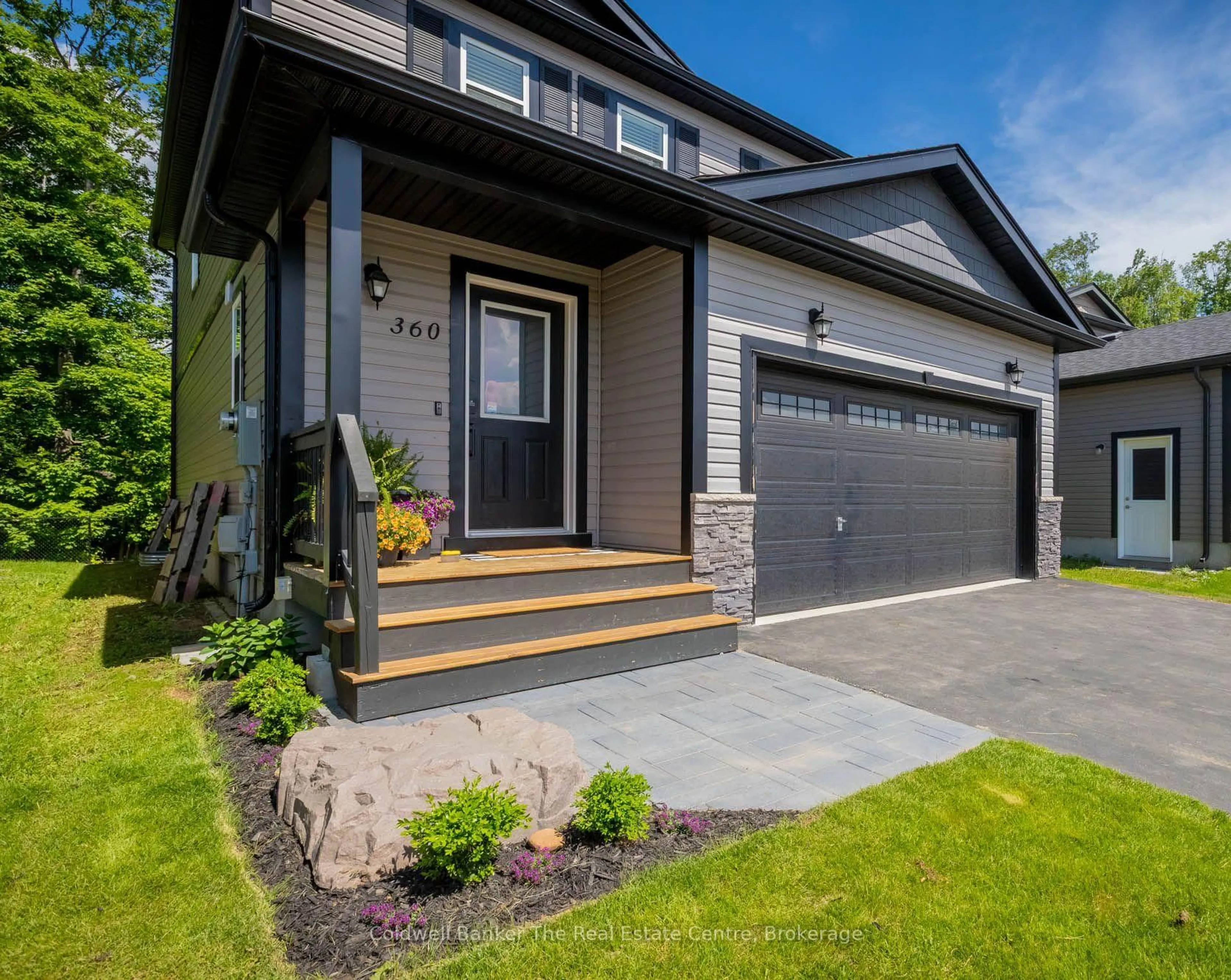 Home with brick exterior material, street for 360 Wild Rose Dr, Gravenhurst Ontario P1P 1A1