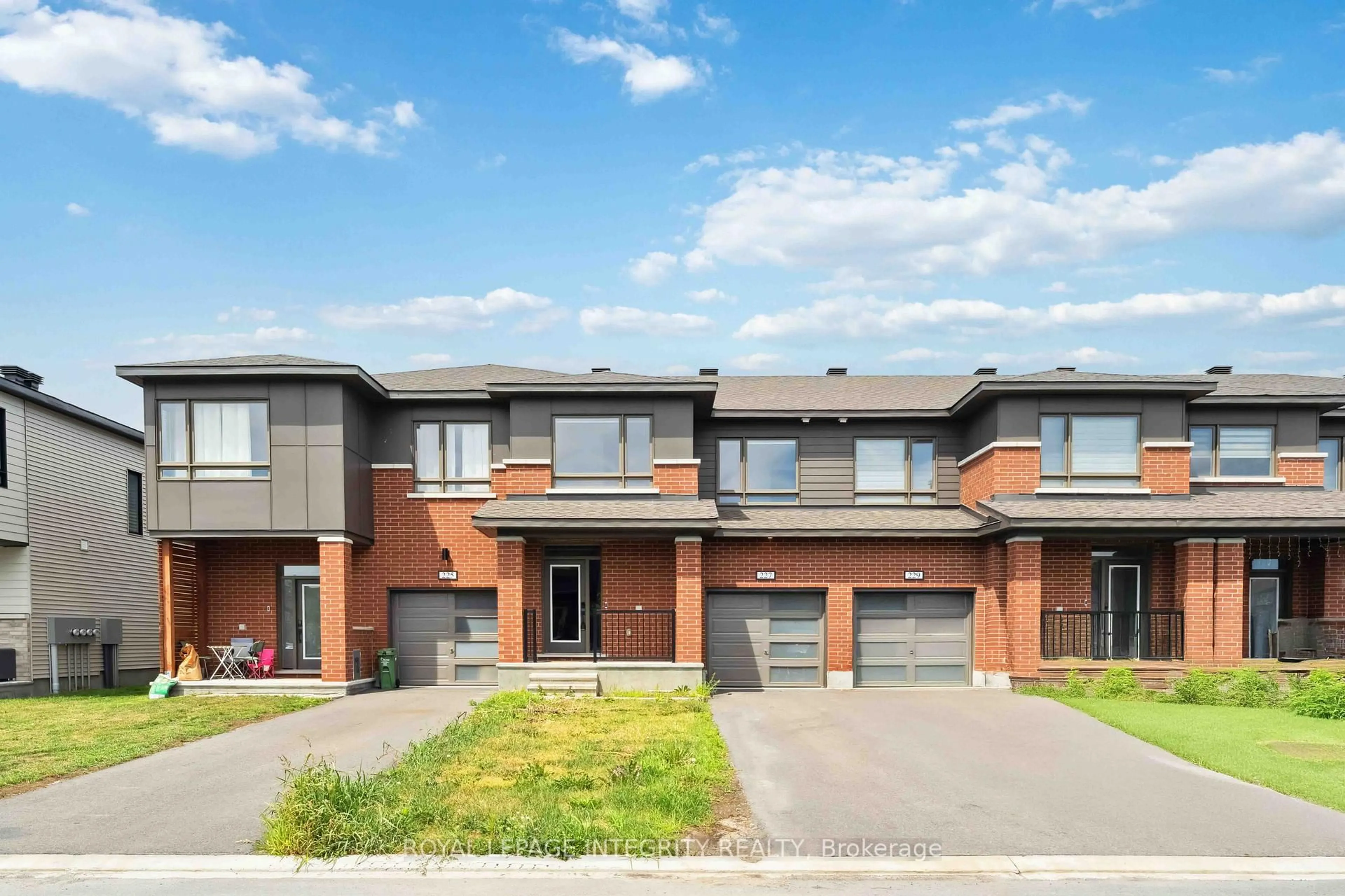 Home with brick exterior material, street for 227 Ormiston Cres, Ottawa Ontario K2J 7E3