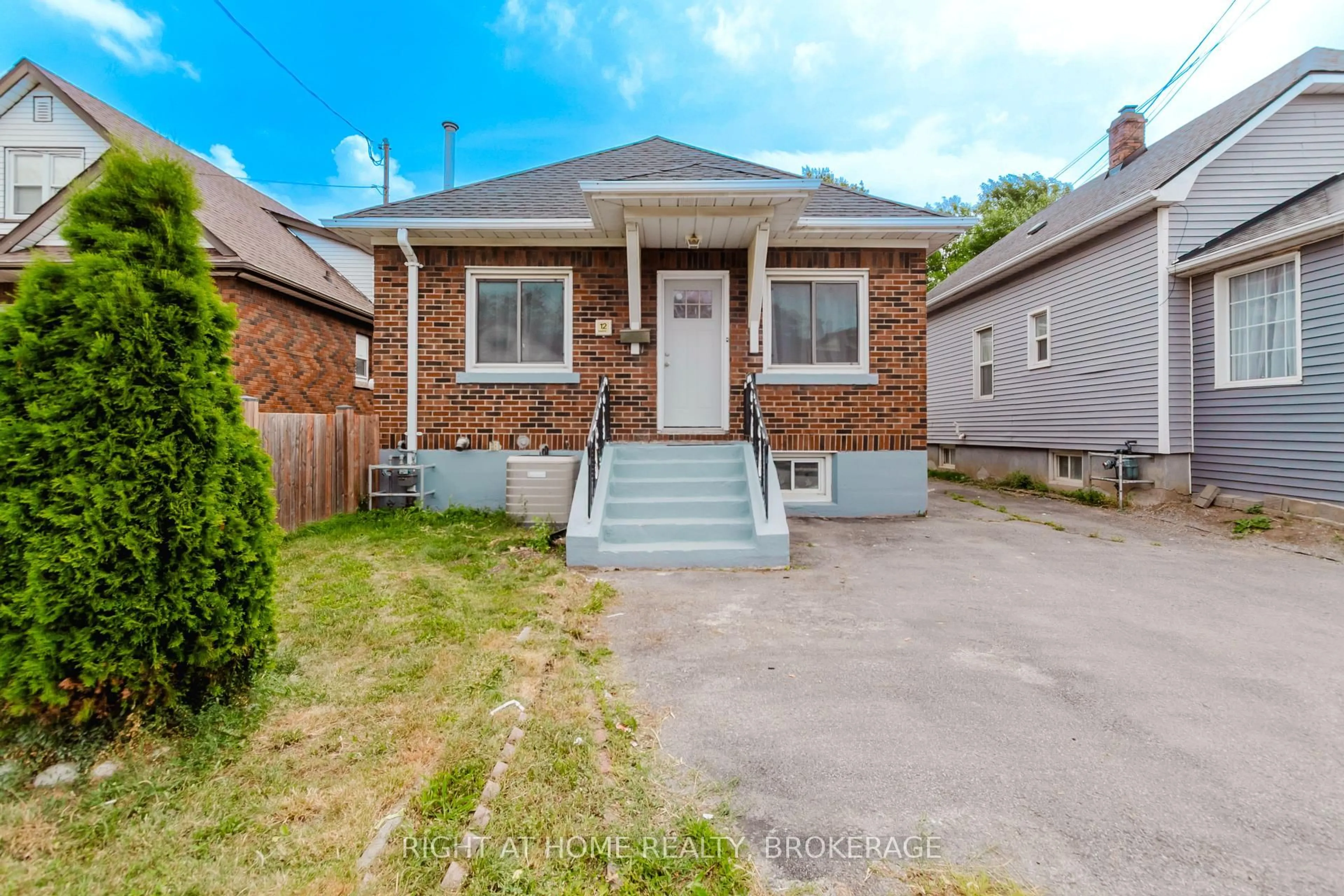 Home with brick exterior material, street for 12 Elberta St, St. Catharines Ontario L2M 5M5