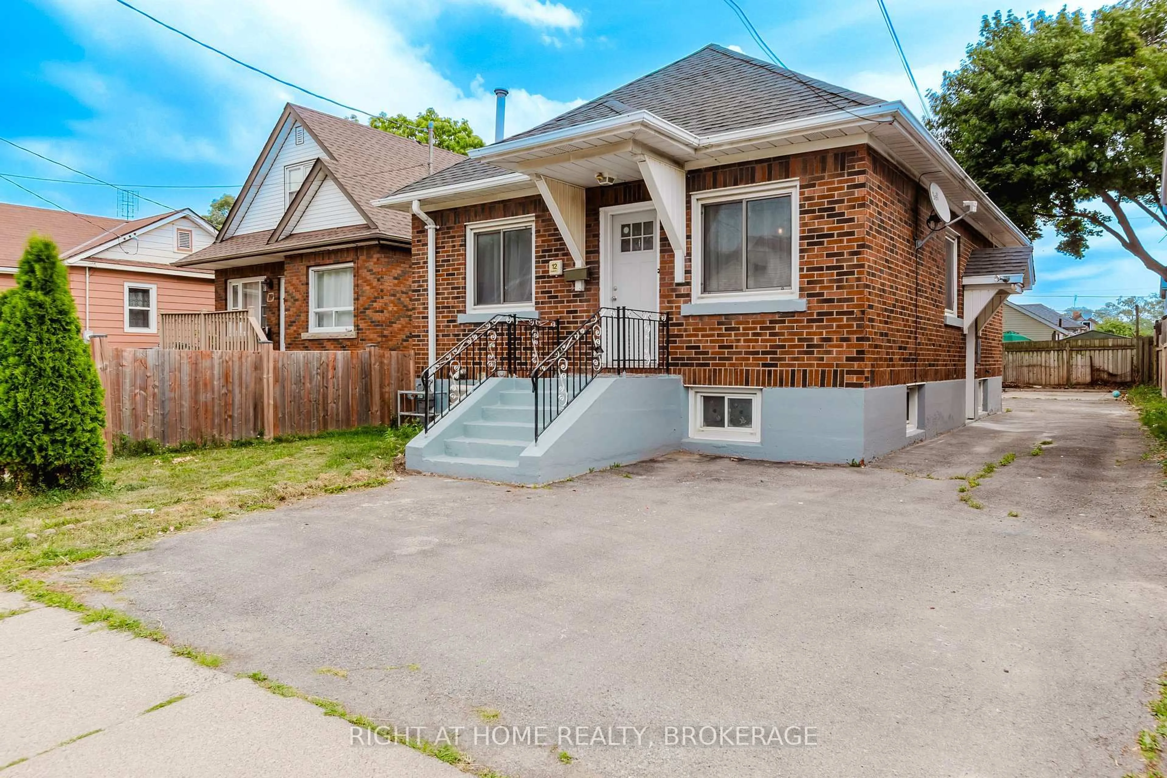 Home with brick exterior material, street for 12 Elberta St, St. Catharines Ontario L2M 5M5
