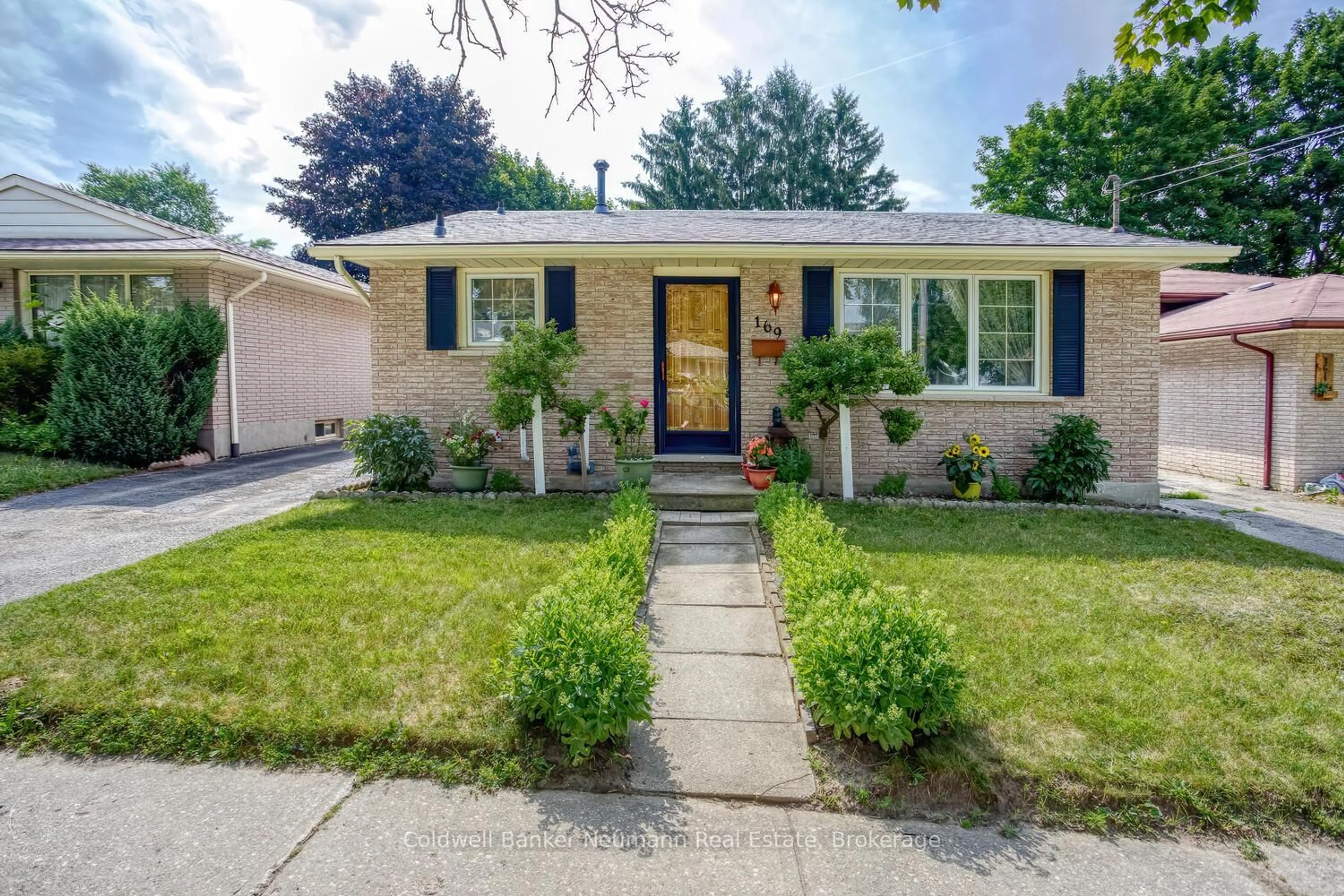Home with brick exterior material, street for 169 Country Club Dr, Guelph Ontario N1E 3K8