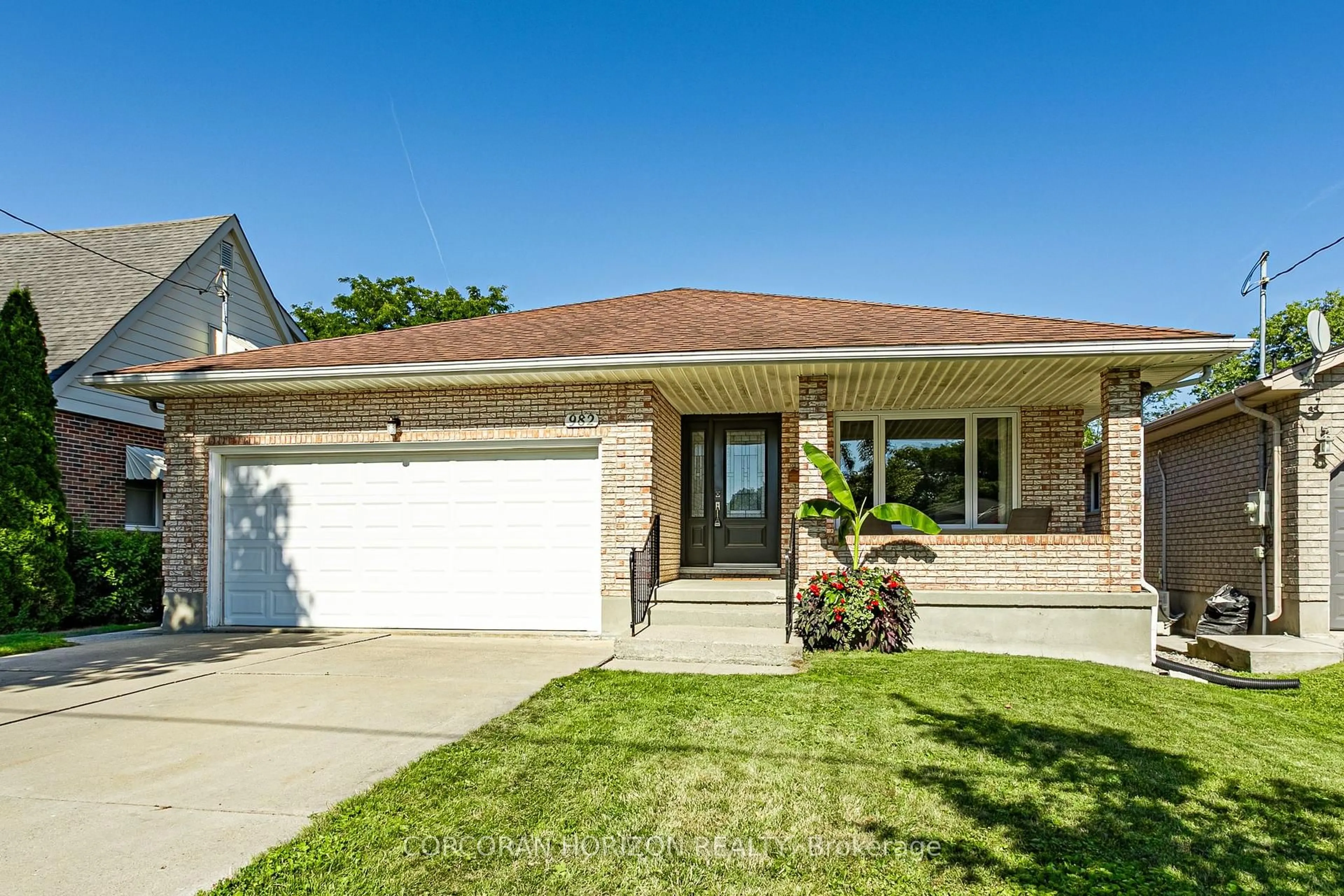 Home with brick exterior material, street for 982 DEARNESS Dr, London South Ontario N6E 1N7