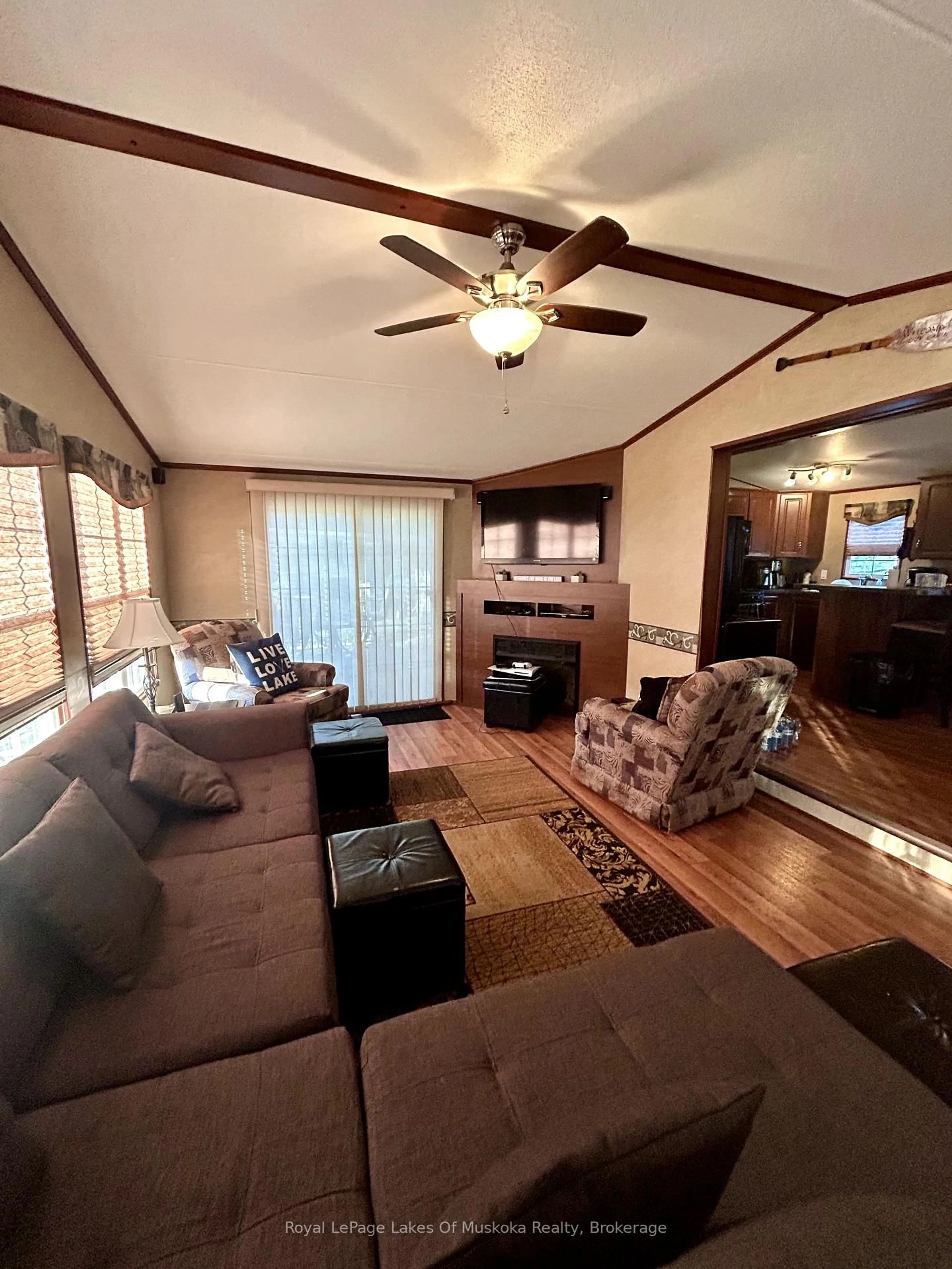 Living room with furniture, wood/laminate floor for 1336 South Morrison Lake Rd #2, Gravenhurst Ontario P1P 1R2
