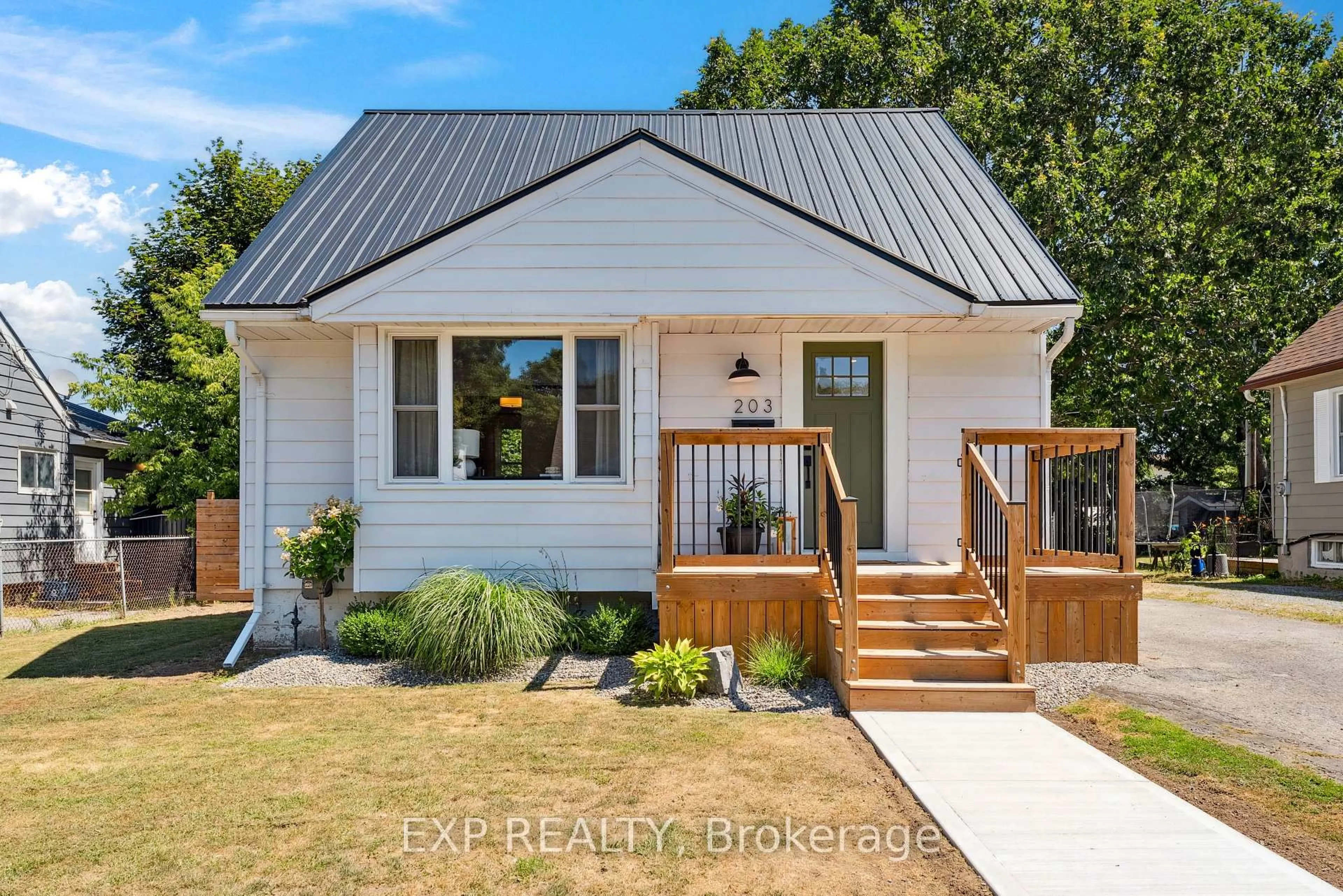 Home with vinyl exterior material, street for 203 Simcoe St, Greater Napanee Ontario K7R 2X9