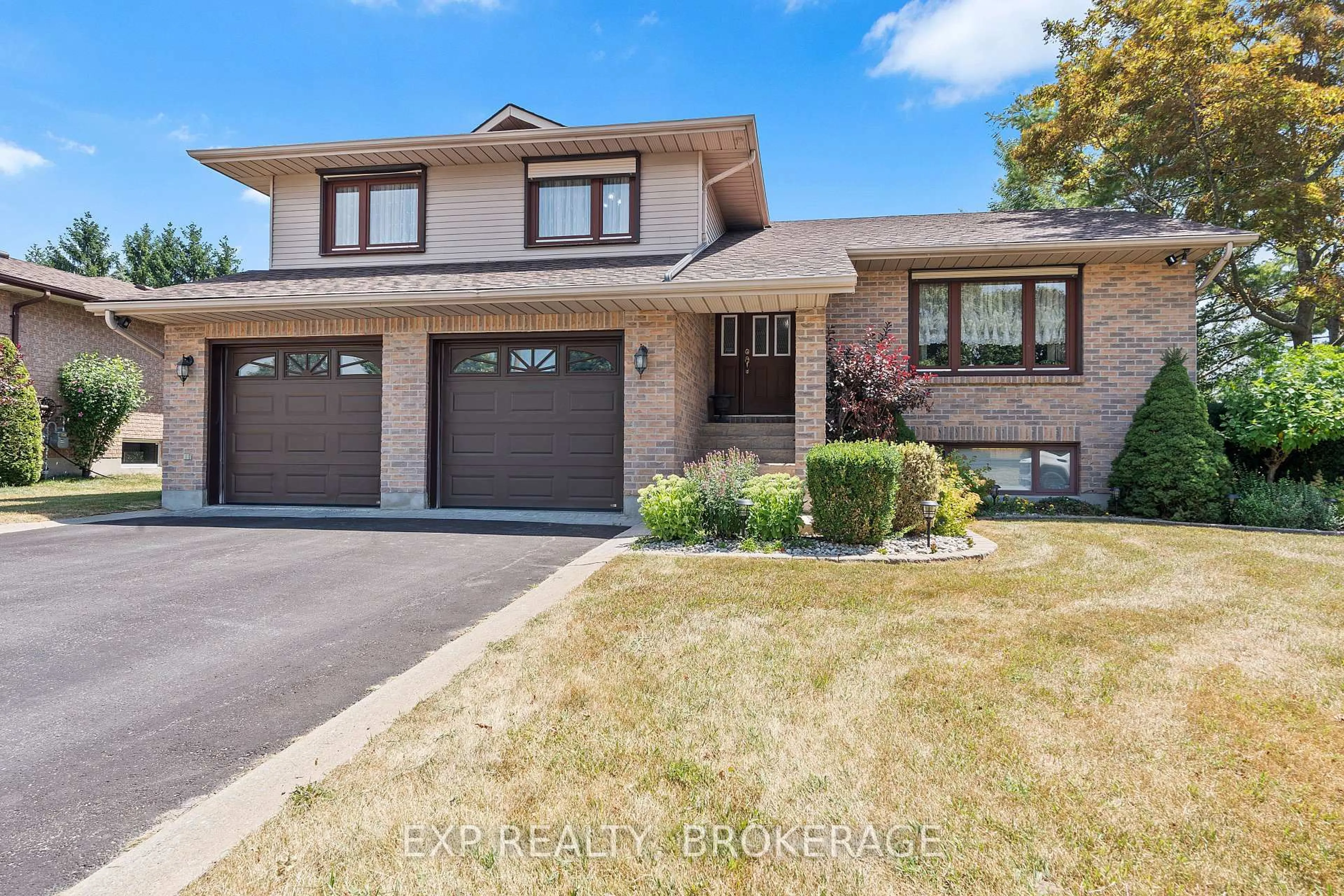 Home with brick exterior material, street for 1424 COTTSMERE Crt, Kingston Ontario K7L 4V4